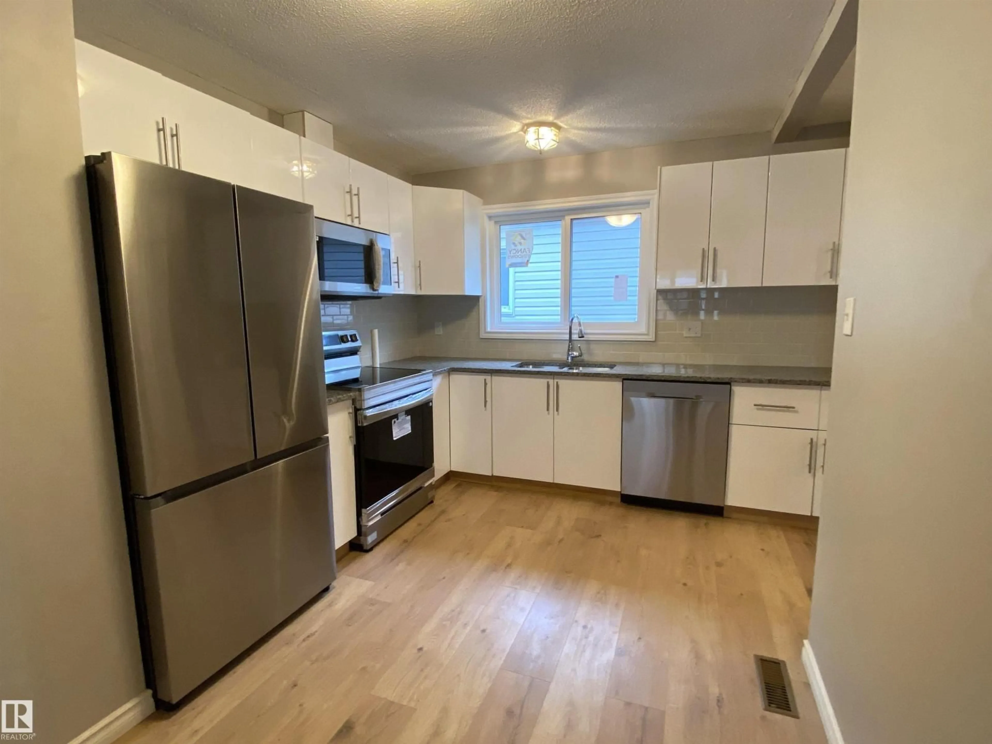 Standard kitchen, wood/laminate floor for 11541 93 ST, Edmonton Alberta T5G1C6