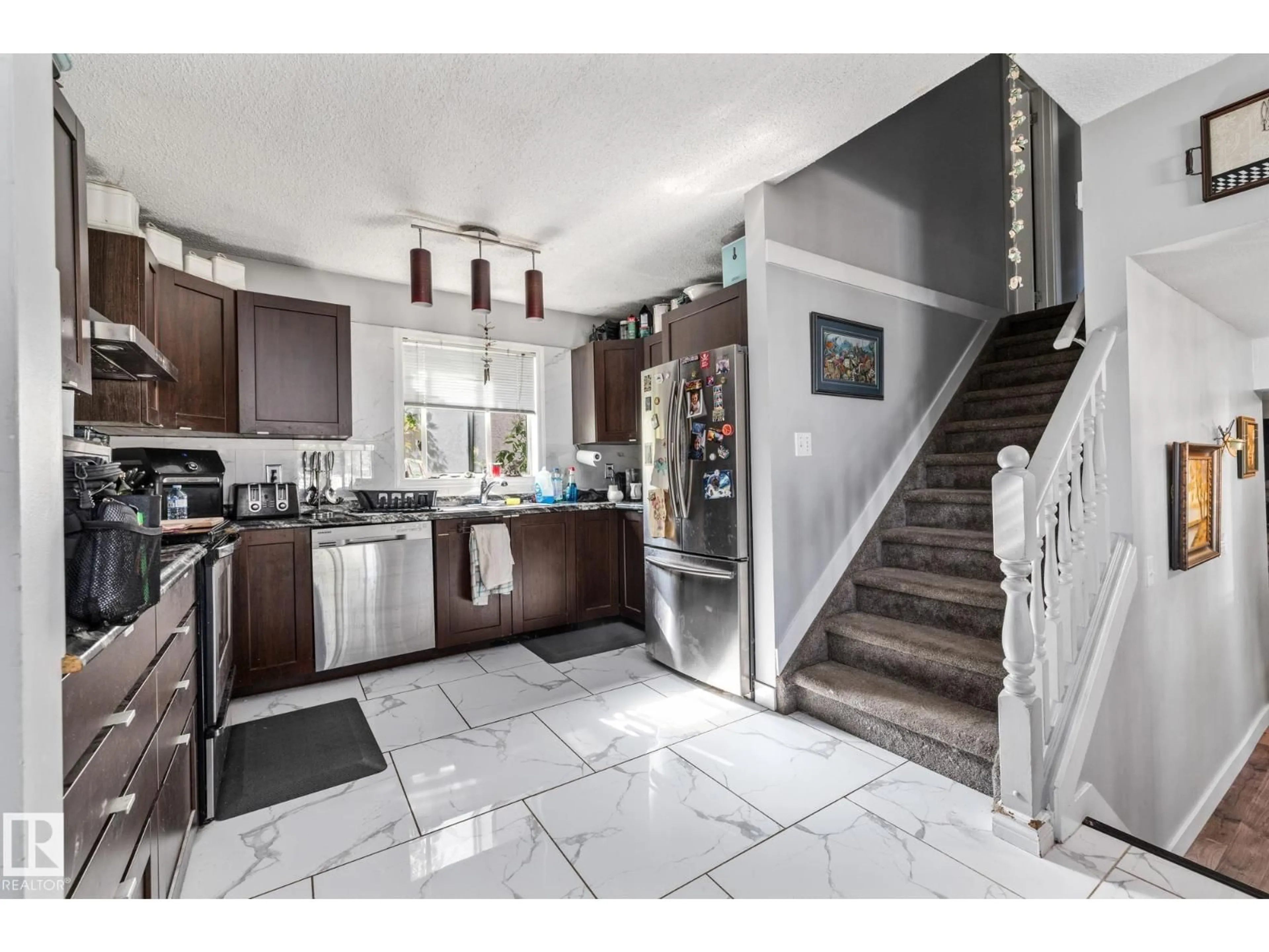 Open concept kitchen, ceramic/tile floor for 329 RIVER POINT, Edmonton Alberta T5A4Z4