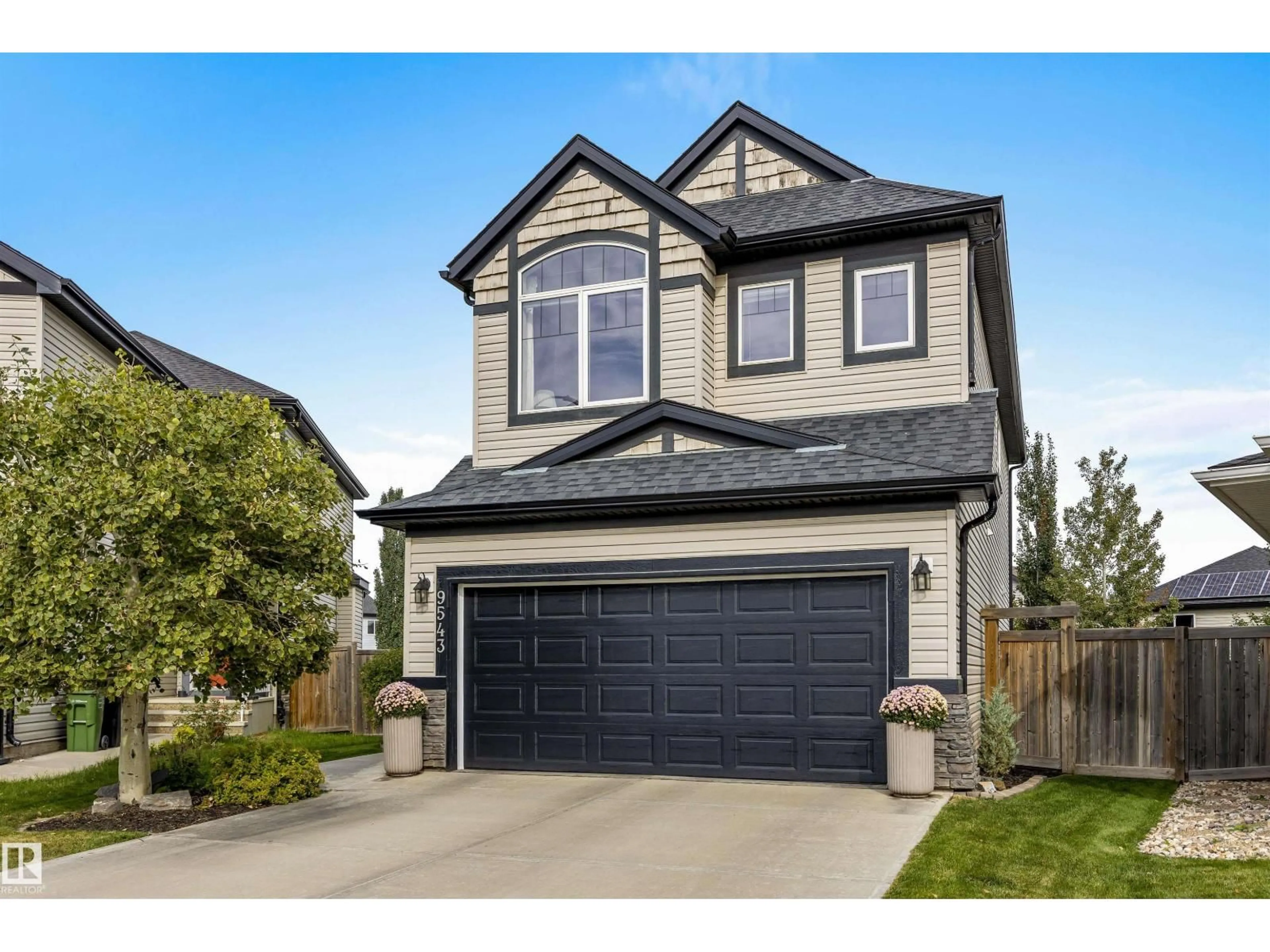 Home with vinyl exterior material, street for 9543 221 ST, Edmonton Alberta T5T4A8