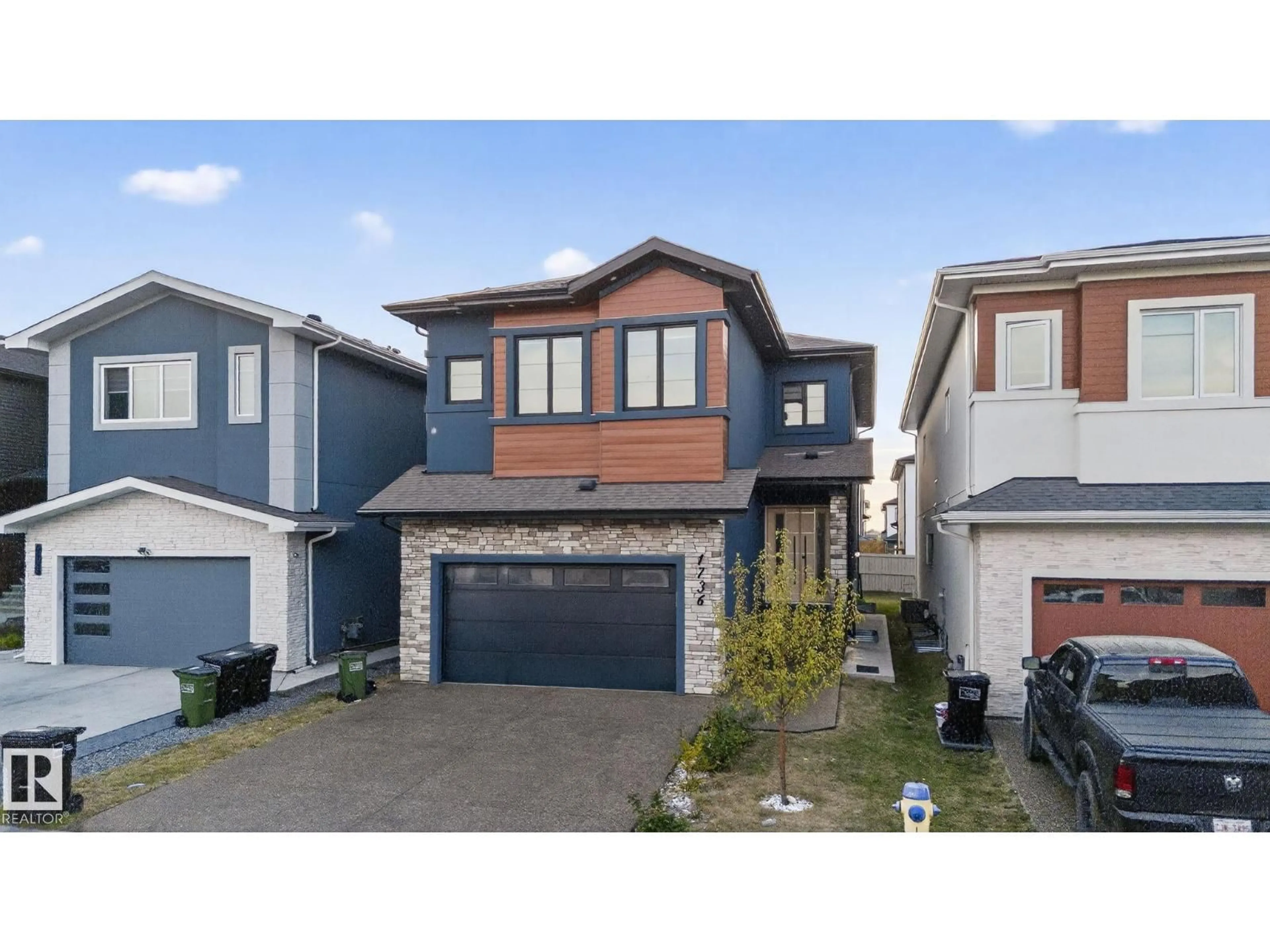 Home with vinyl exterior material, street for 1736 18 ST, Edmonton Alberta T6T2N2