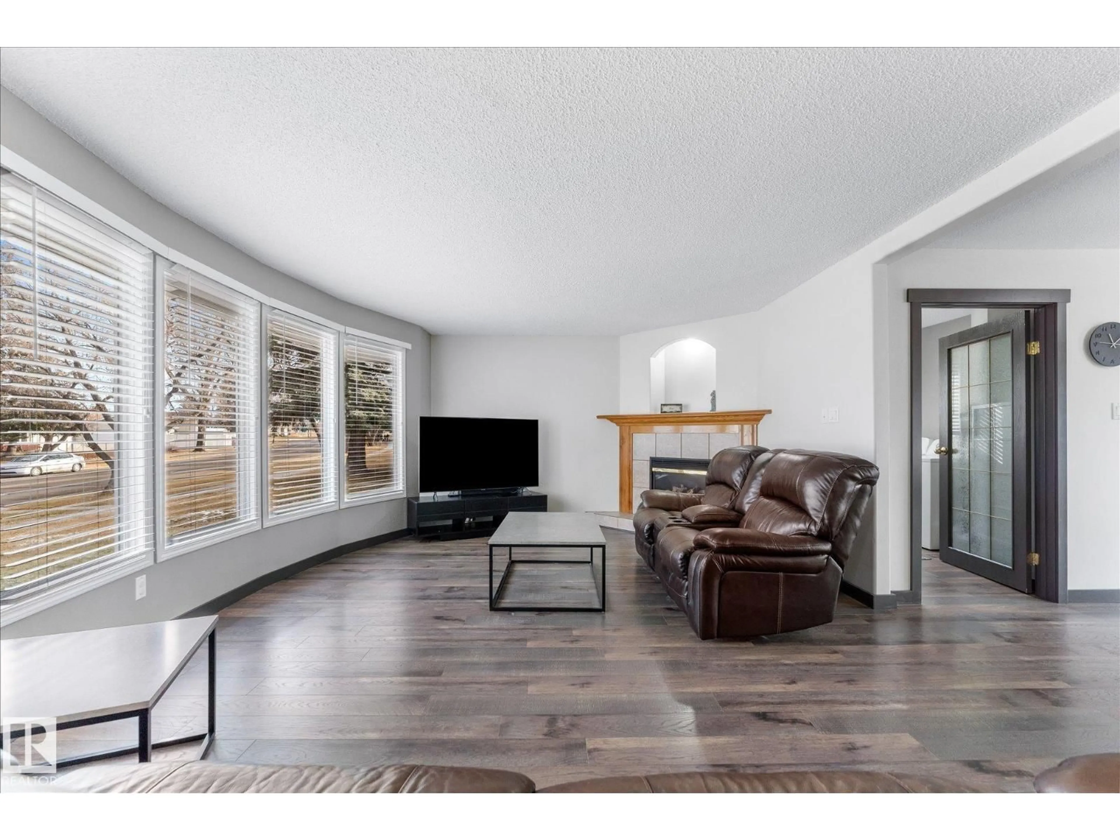 Living room with furniture, wood/laminate floor for 140 BROOKWOOD DRIVE, Spruce Grove Alberta T7X1G6