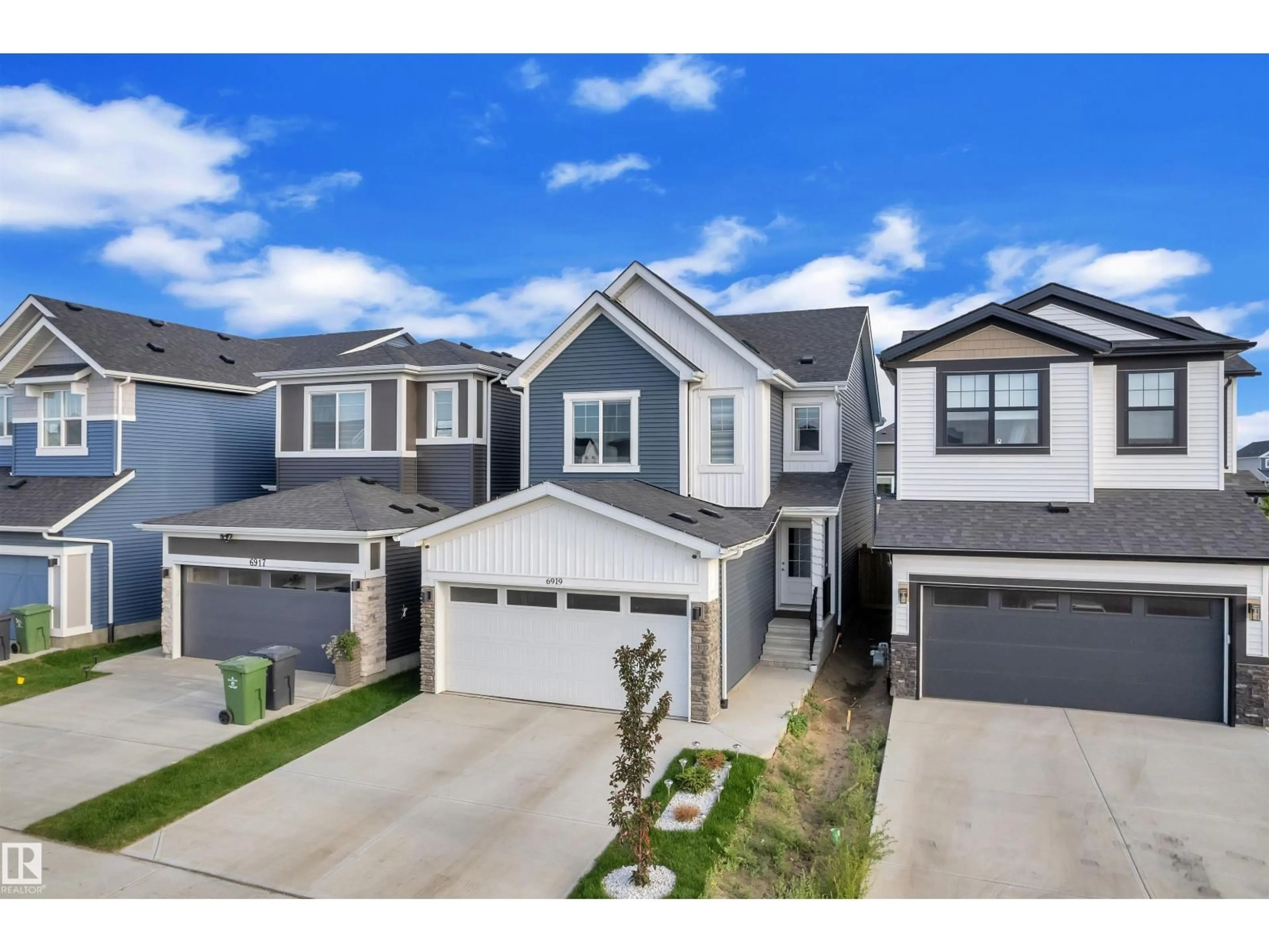 A pic from outside/outdoor area/front of a property/back of a property/a pic from drone, street for 6919 54 AV, Beaumont Alberta T4X2Z7