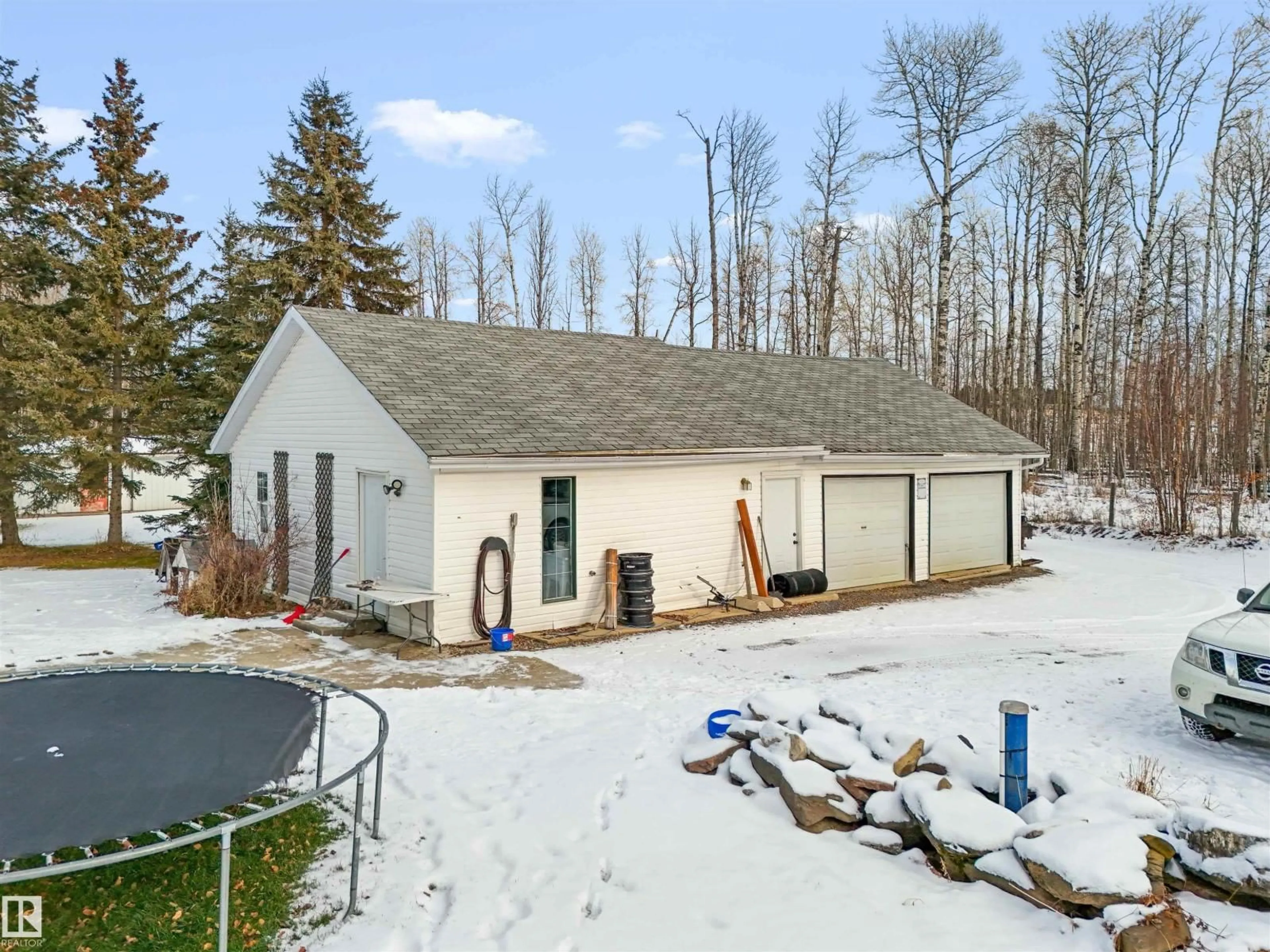 A pic from outside/outdoor area/front of a property/back of a property/a pic from drone, unknown for 75042 TWP ROAD 464, Rural Wetaskiwin County Alberta T0C0A0