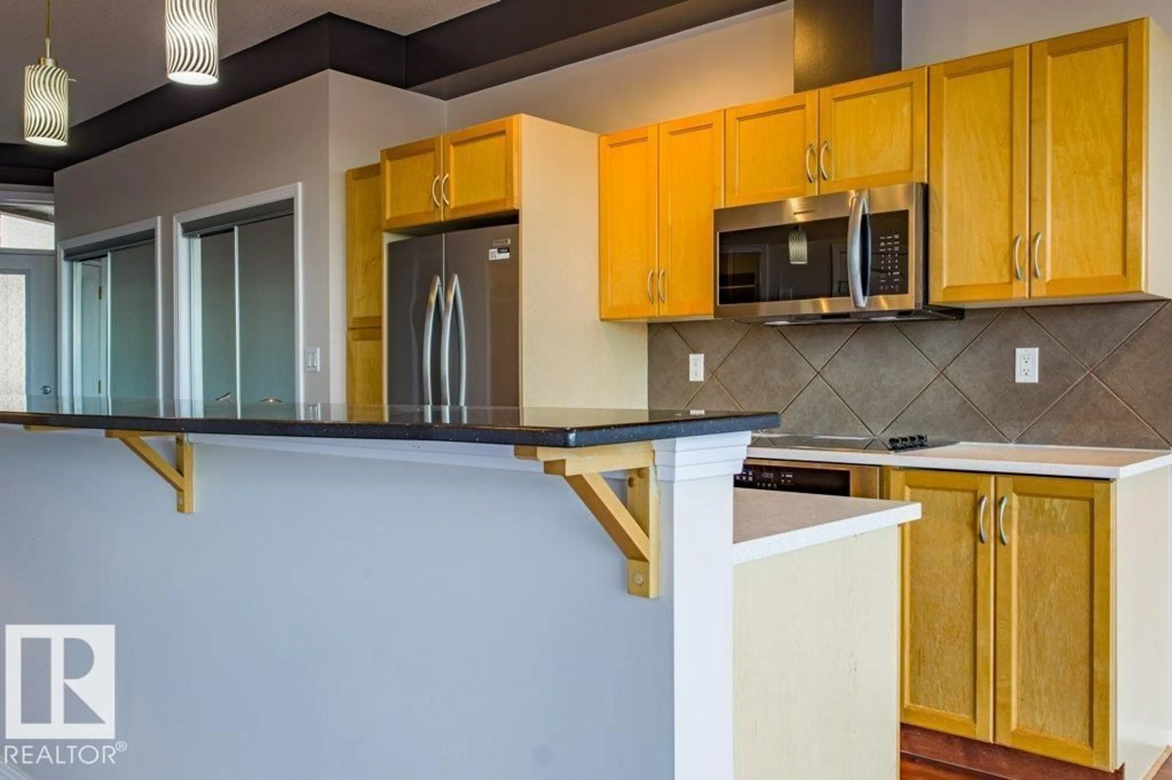 Open concept kitchen, unknown for 403 - 4835 104 A ST, Edmonton Alberta T6H0R5