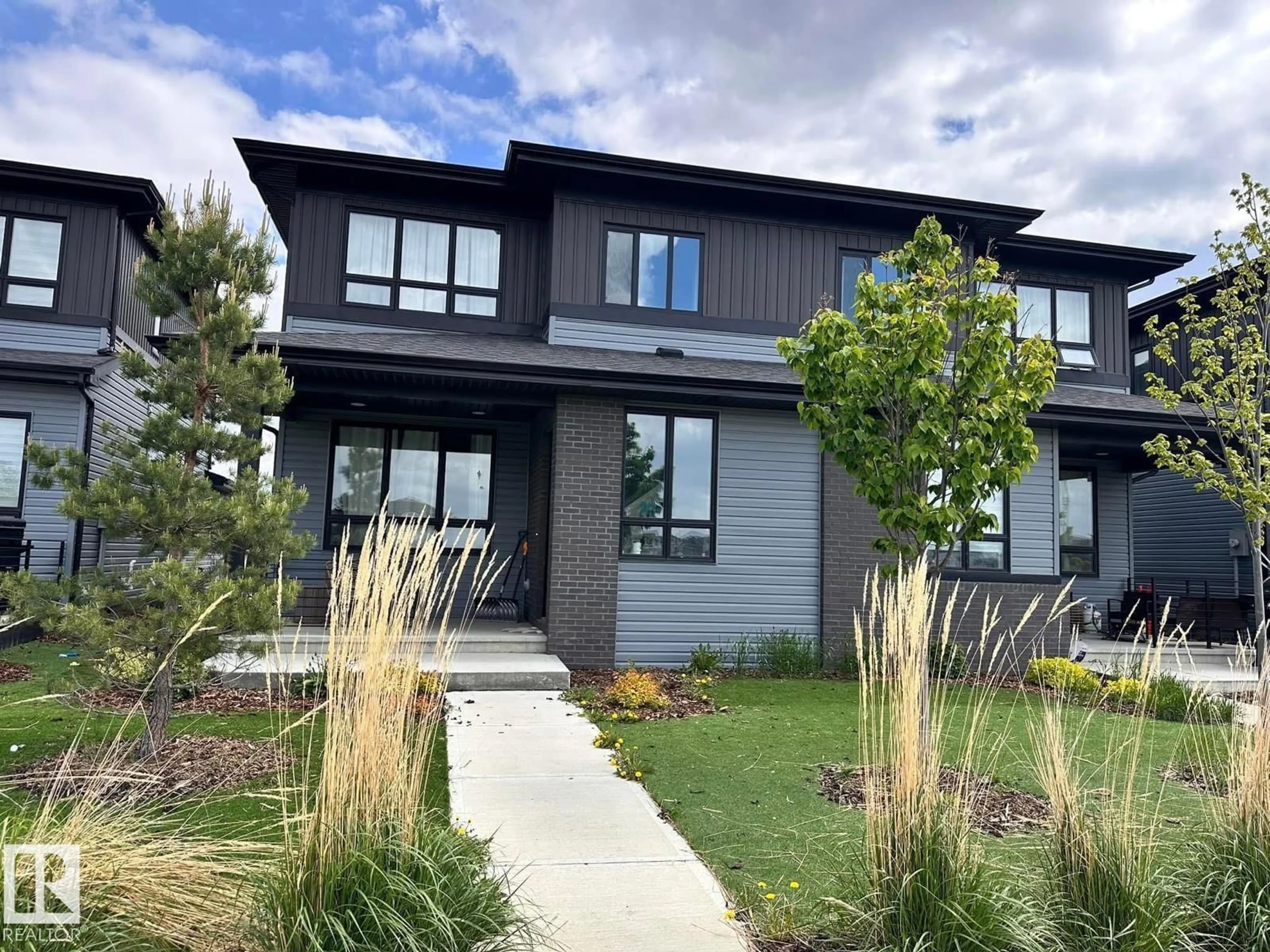 Home with vinyl exterior material, street for 75 GREENFIELD LI, Fort Saskatchewan Alberta T8L0Y1