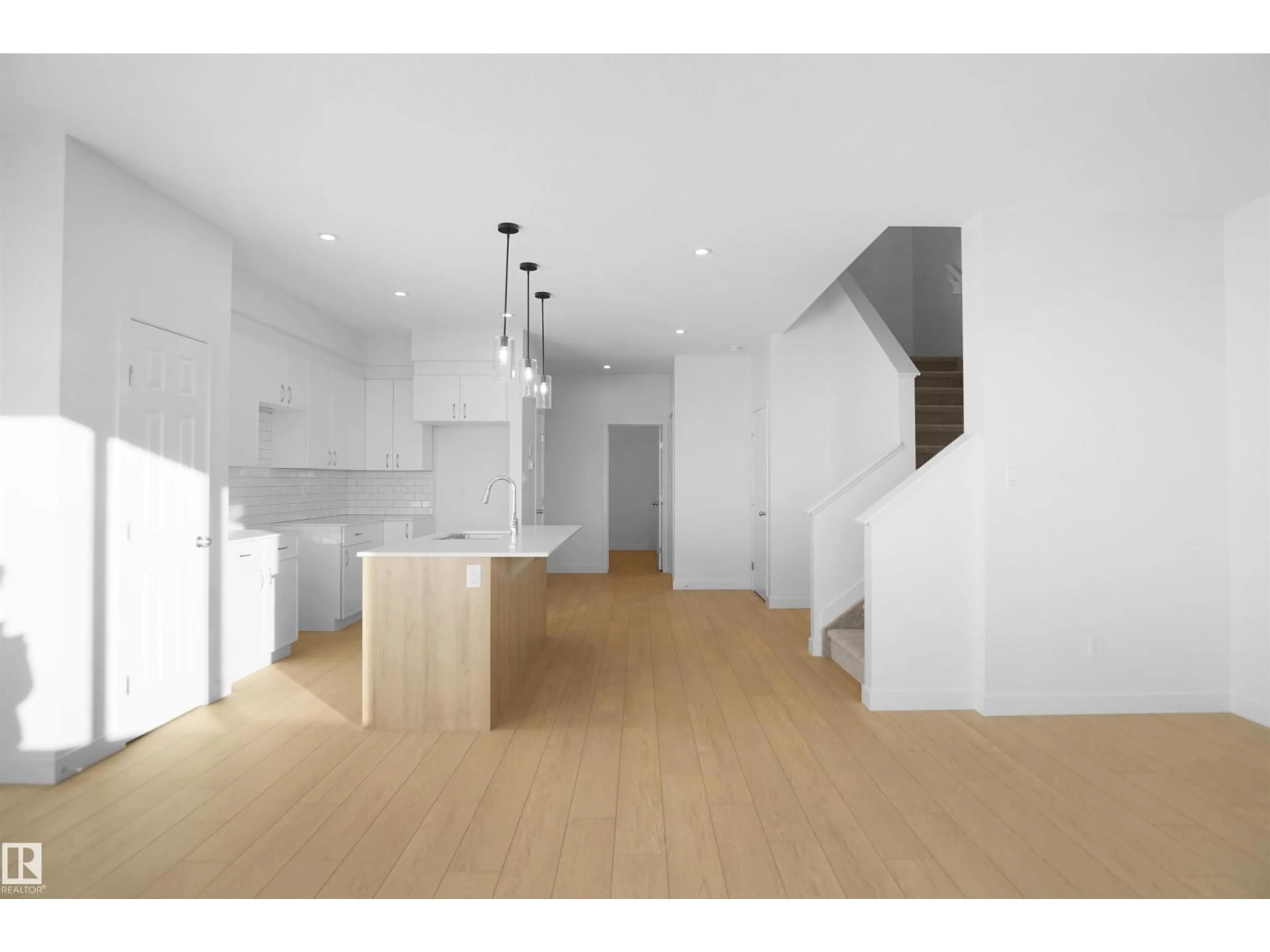 Open concept kitchen, wood/laminate floor for NW - 2116 210 ST, Edmonton Alberta T6M1P7