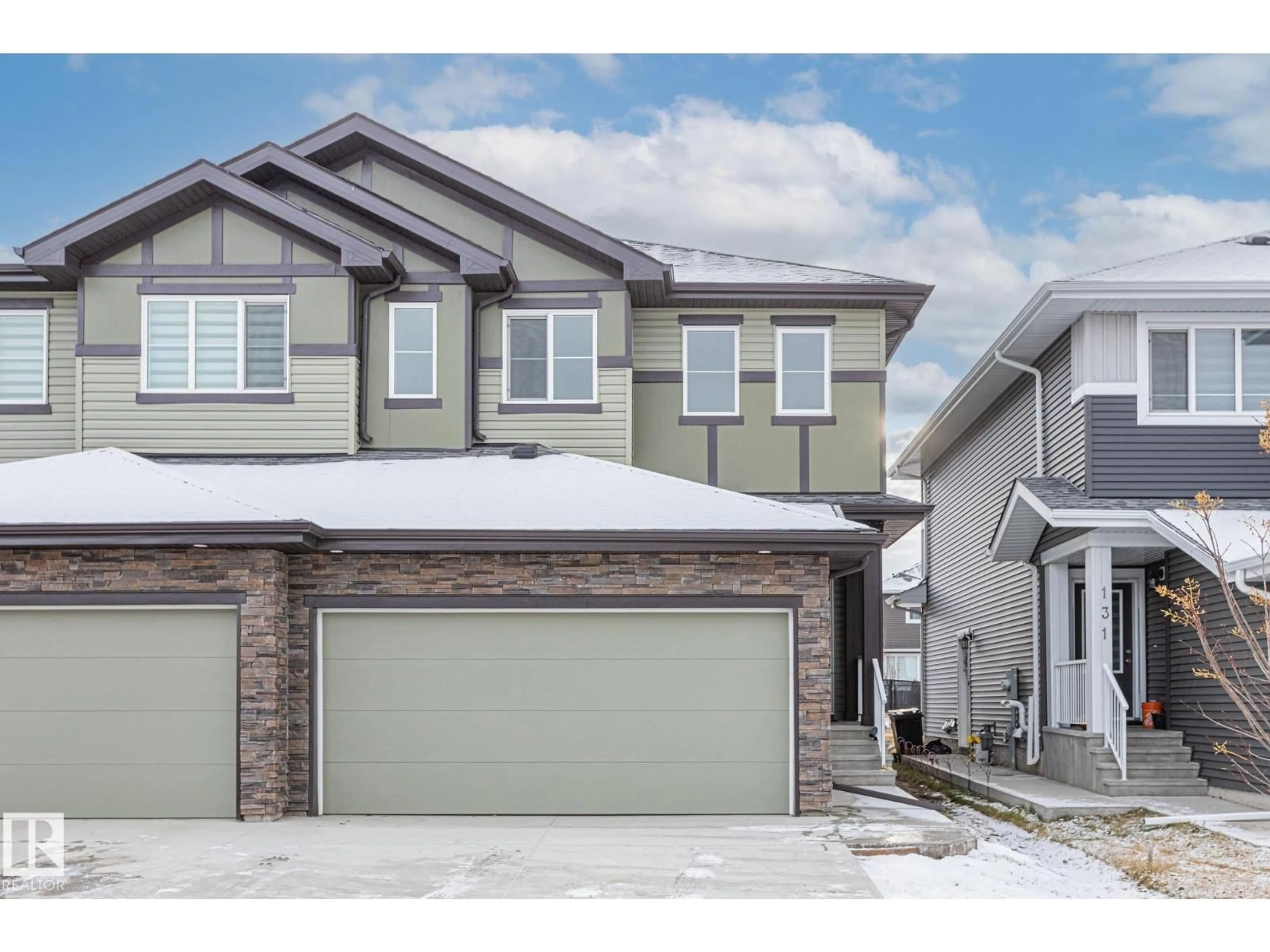 Home with vinyl exterior material, street for 129 ELM ST, Fort Saskatchewan Alberta T8L0X8