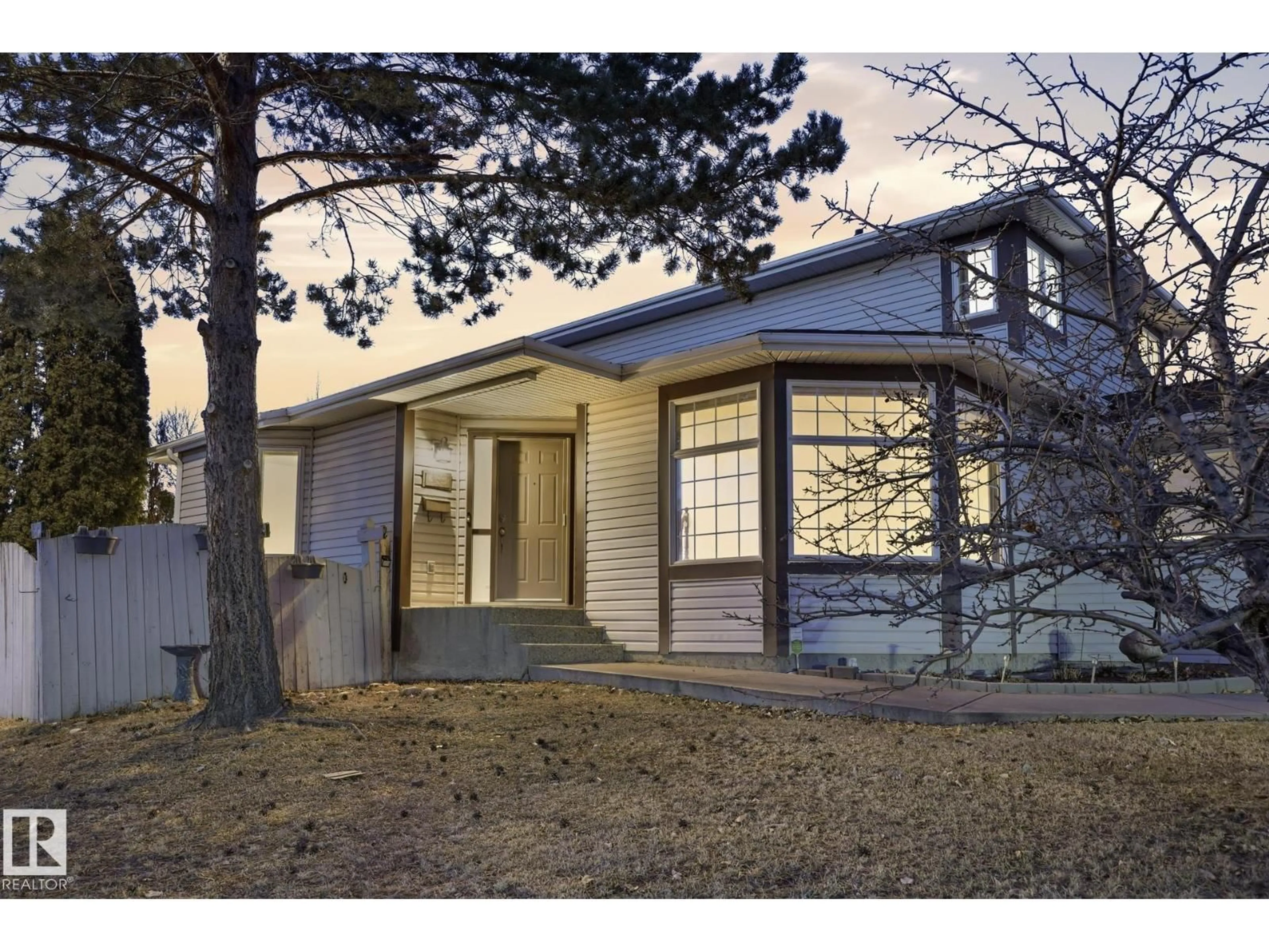 Home with vinyl exterior material, street for 5304 190 ST, Edmonton Alberta T6M2L2