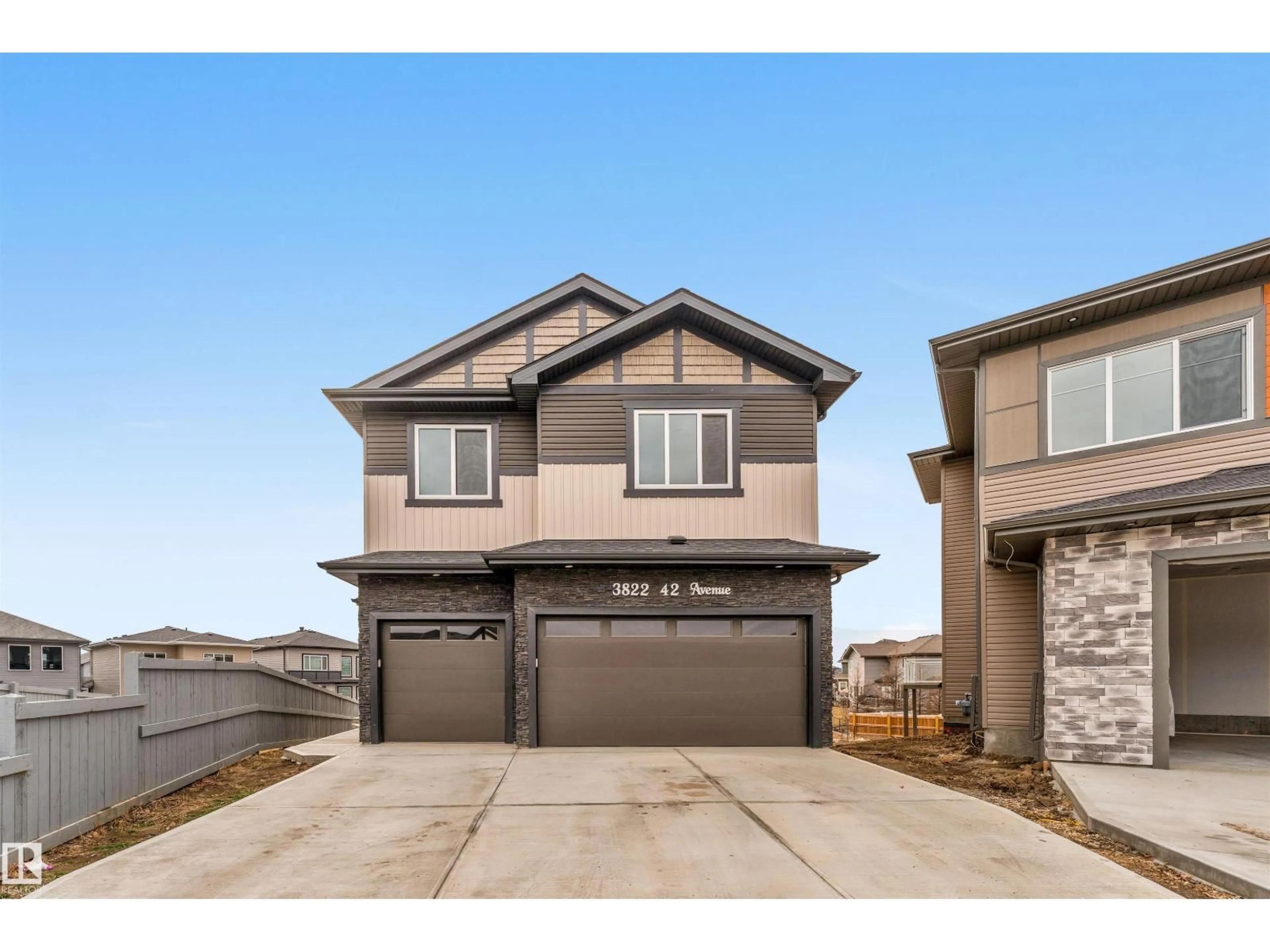 Home with vinyl exterior material, street for 3822 42 AV, Beaumont Alberta T4X2Z6