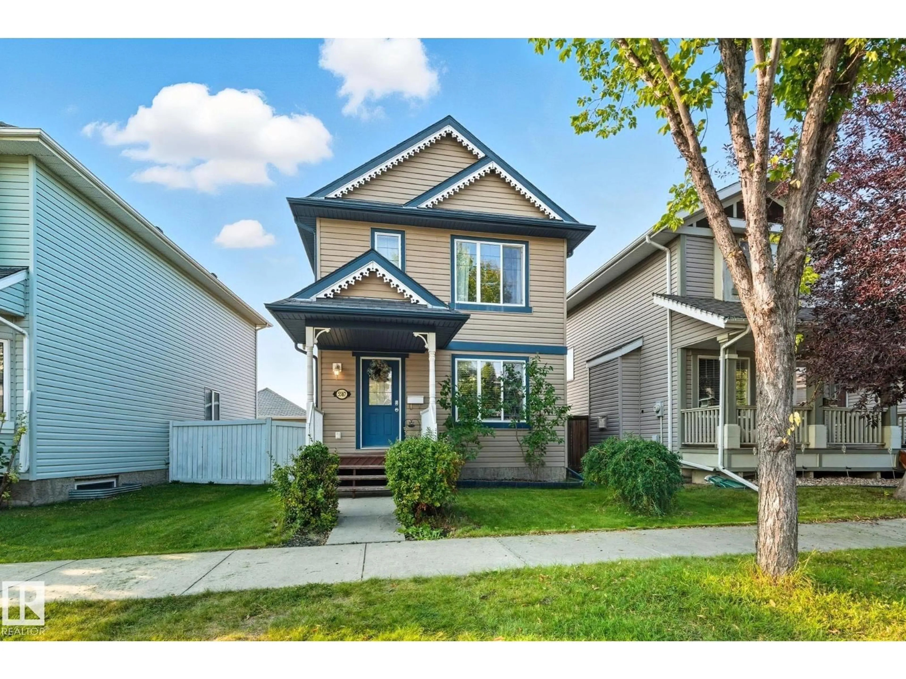 Home with vinyl exterior material, street for 5587 STEVENS CR, Edmonton Alberta T6R0A4