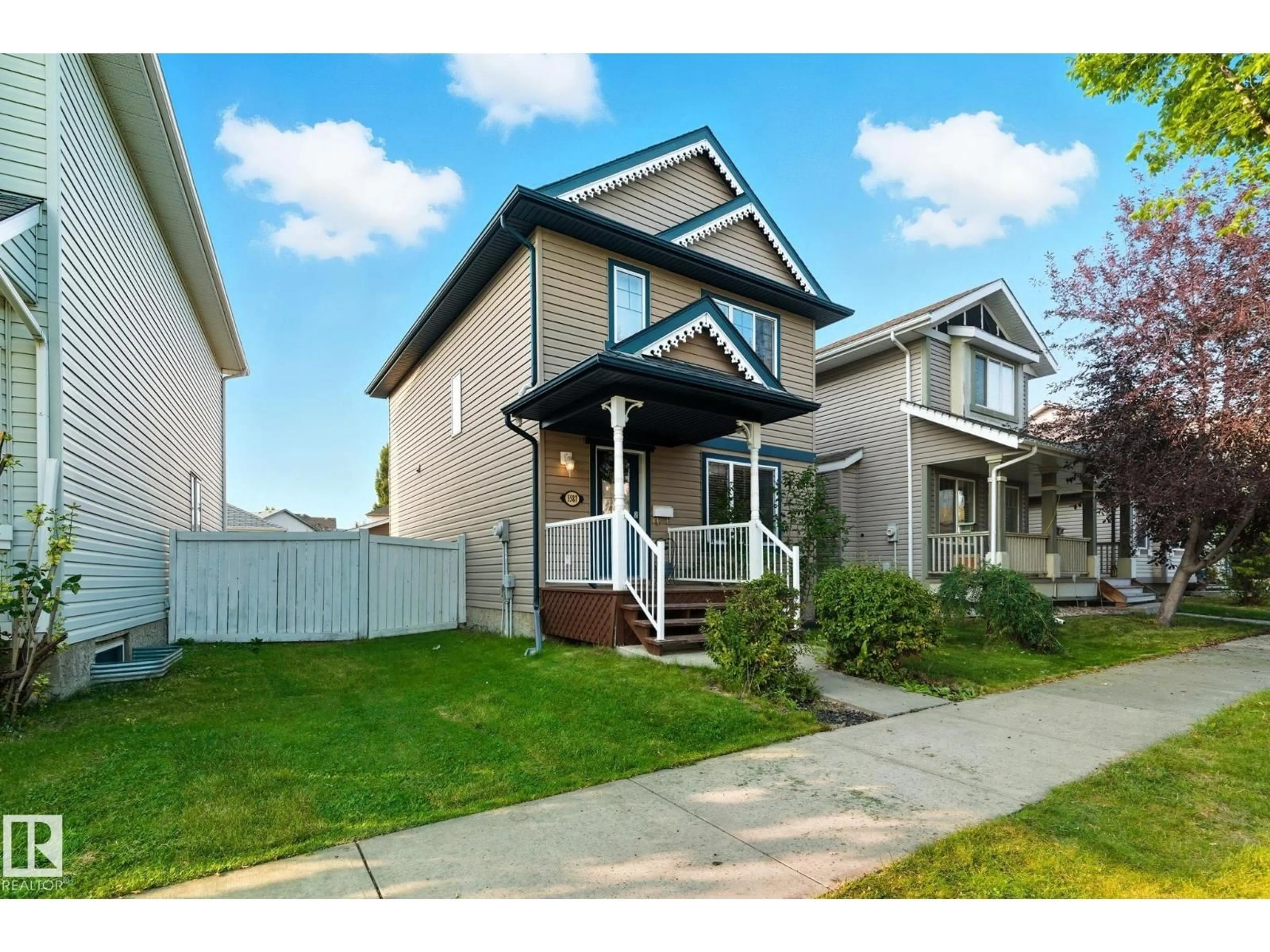 Home with vinyl exterior material, street for 5587 STEVENS CR, Edmonton Alberta T6R0A4