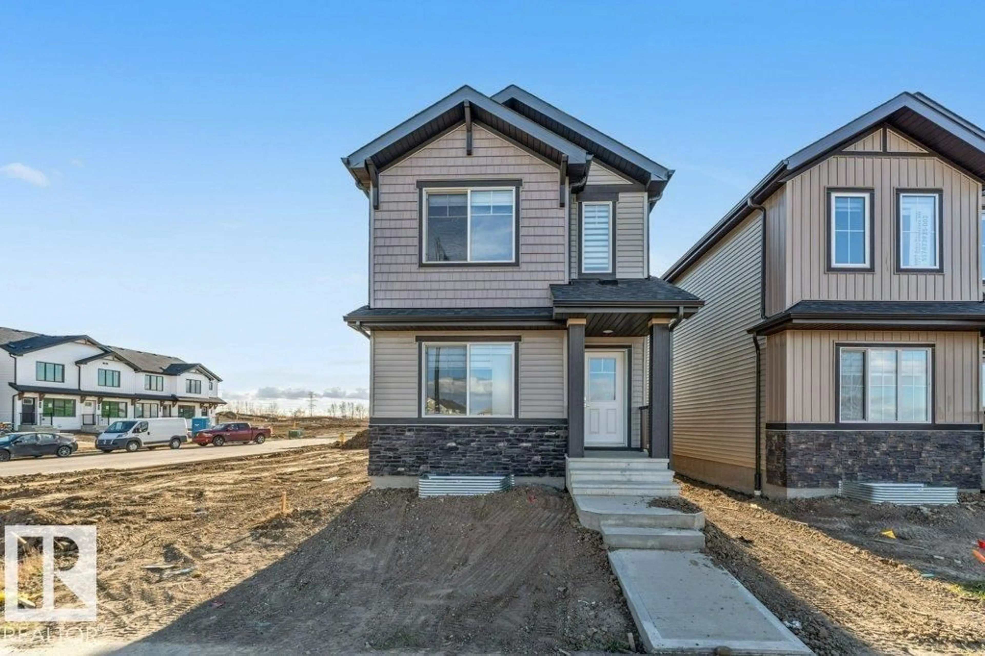Home with vinyl exterior material, street for 1007 ASTER BV, Edmonton Alberta T6T2W8
