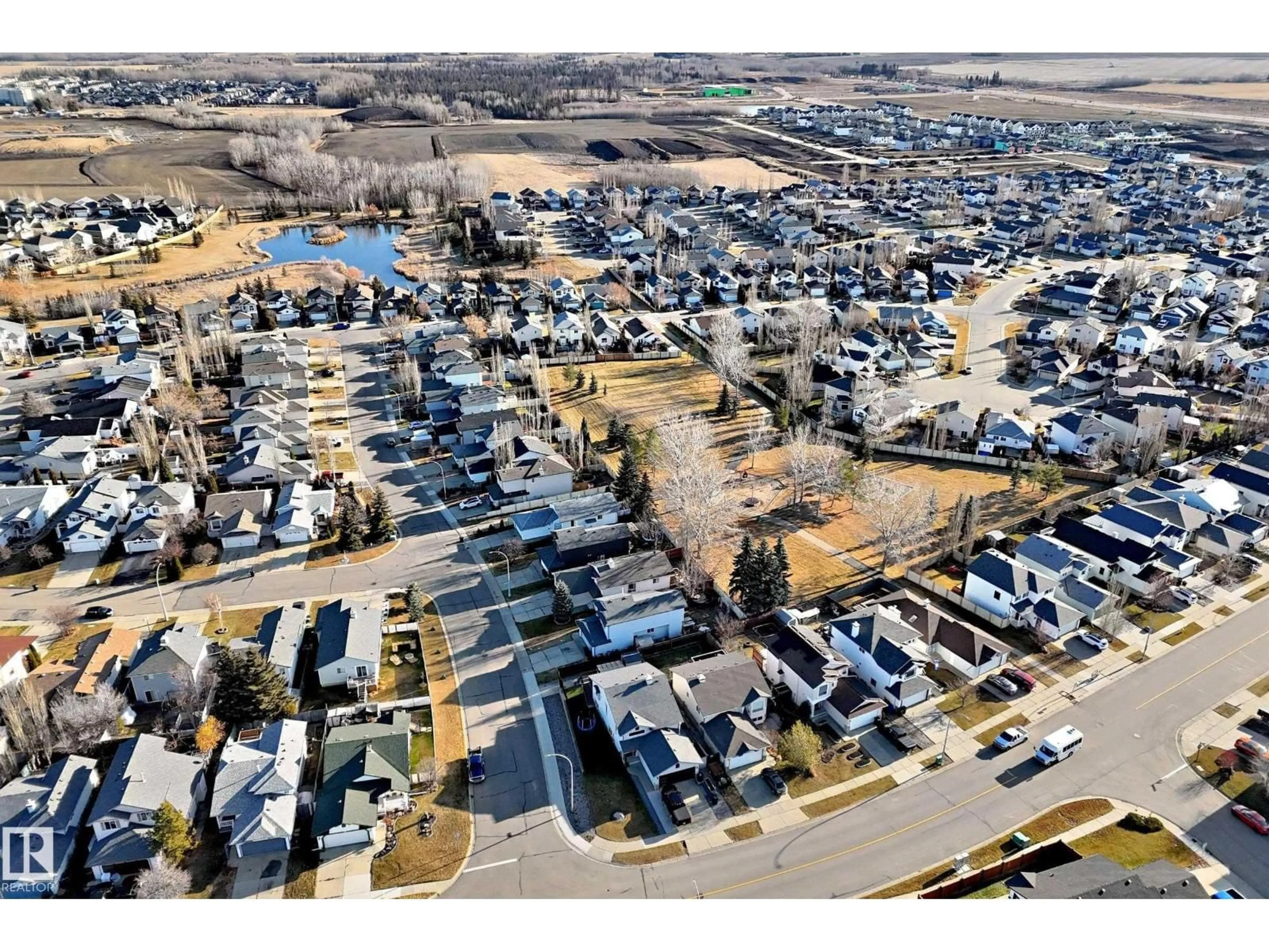 A pic from outside/outdoor area/front of a property/back of a property/a pic from drone, street for 22 LAKEWOOD CV, Spruce Grove Alberta T7X4B4