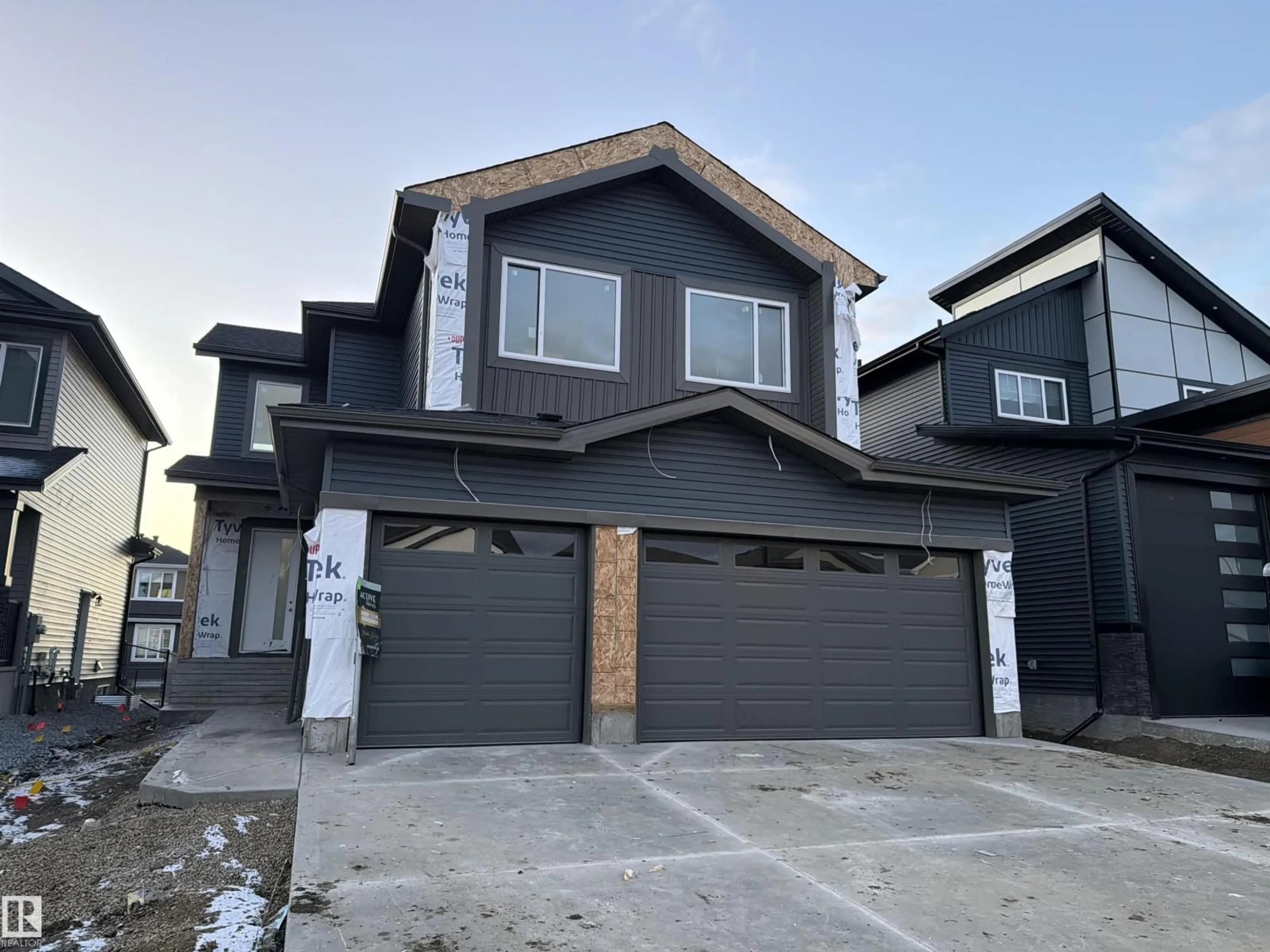Home with vinyl exterior material, street for 26 BAKER ST, Ardrossan Alberta T8E0B6