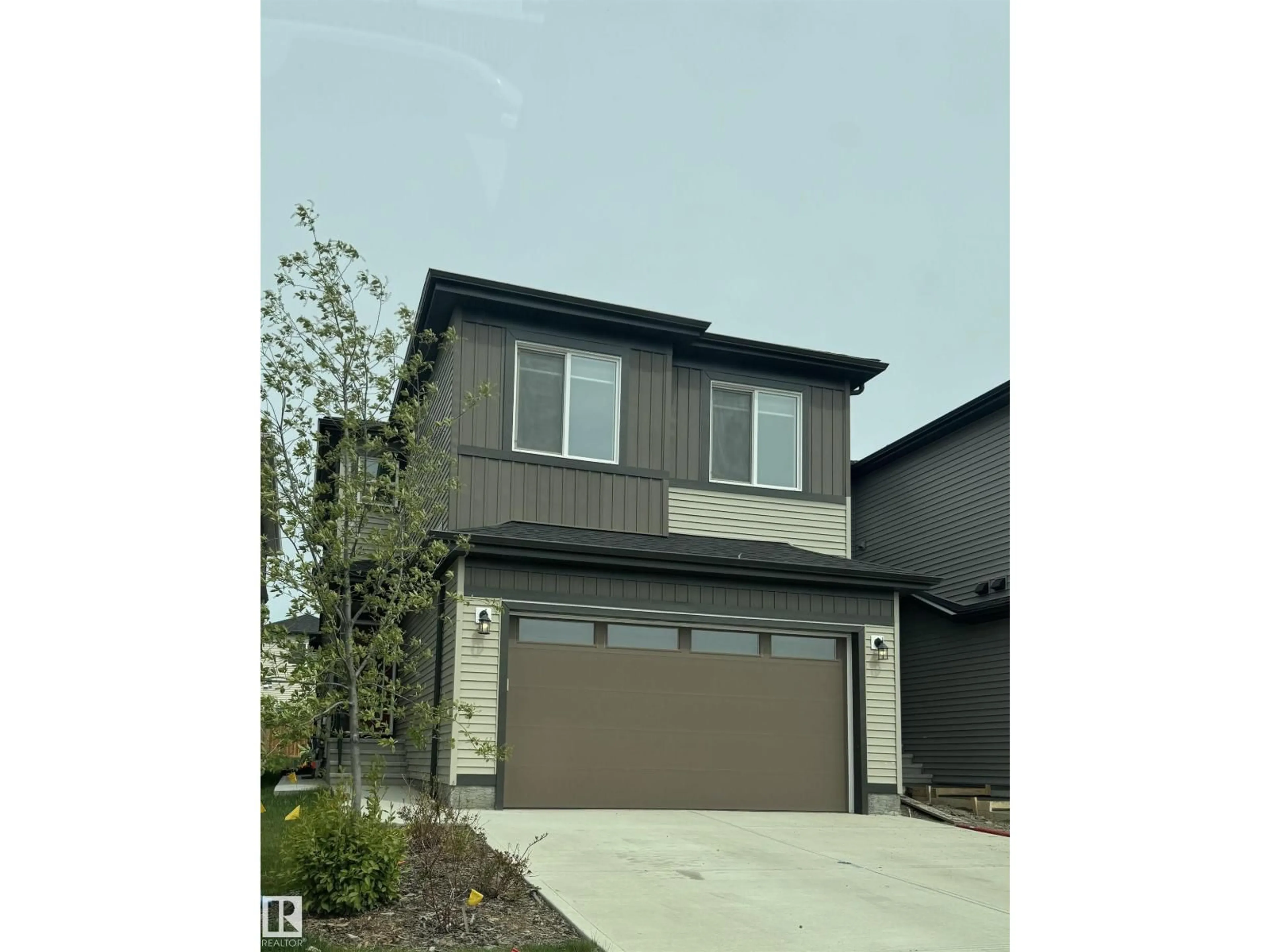 Home with vinyl exterior material, street for 374 BLUFF CV, Leduc Alberta T9E1M9
