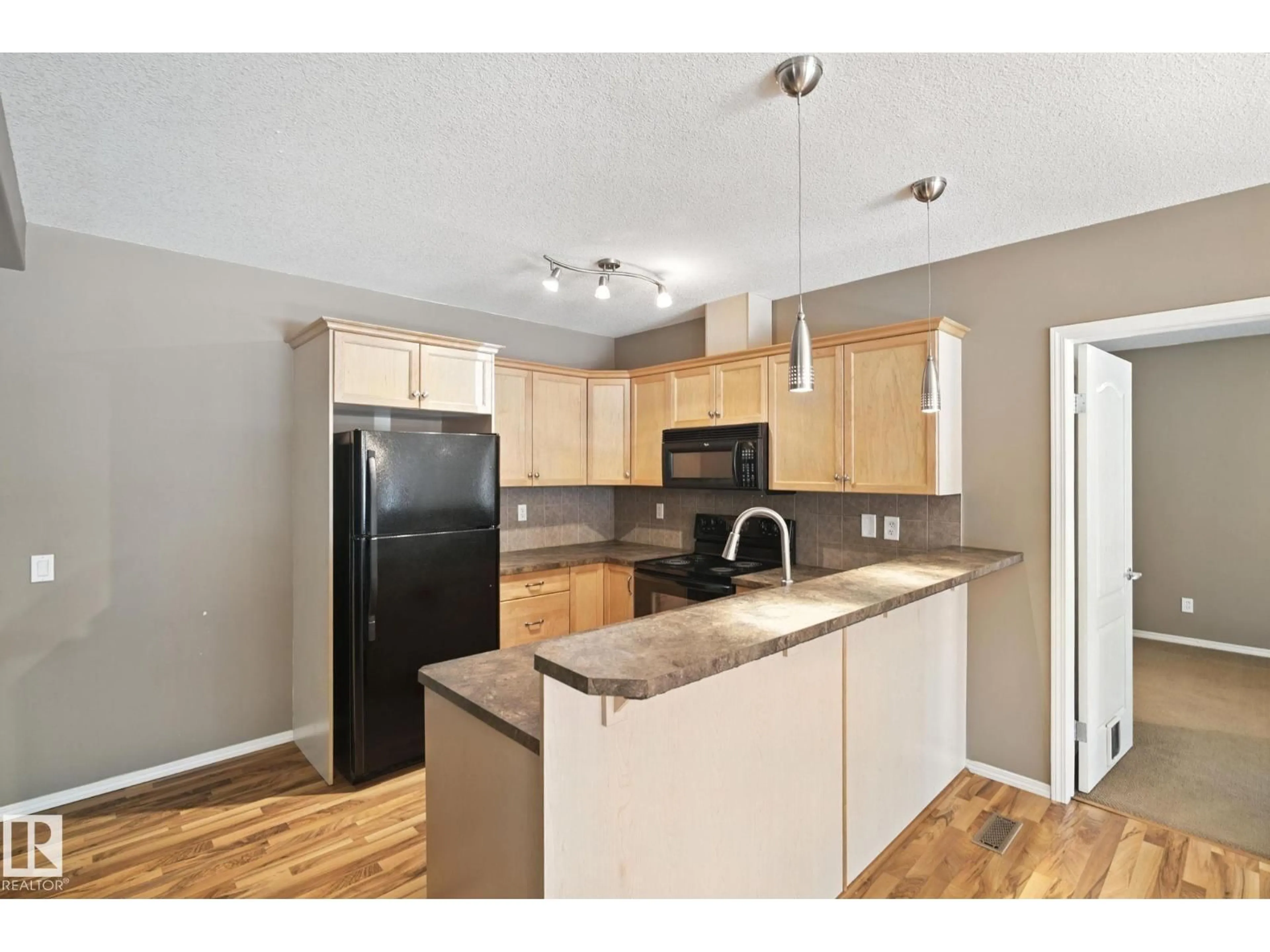 Standard kitchen, wood/laminate floor for 21 671 SILVER BERRY RD, Edmonton Alberta T6T0B7
