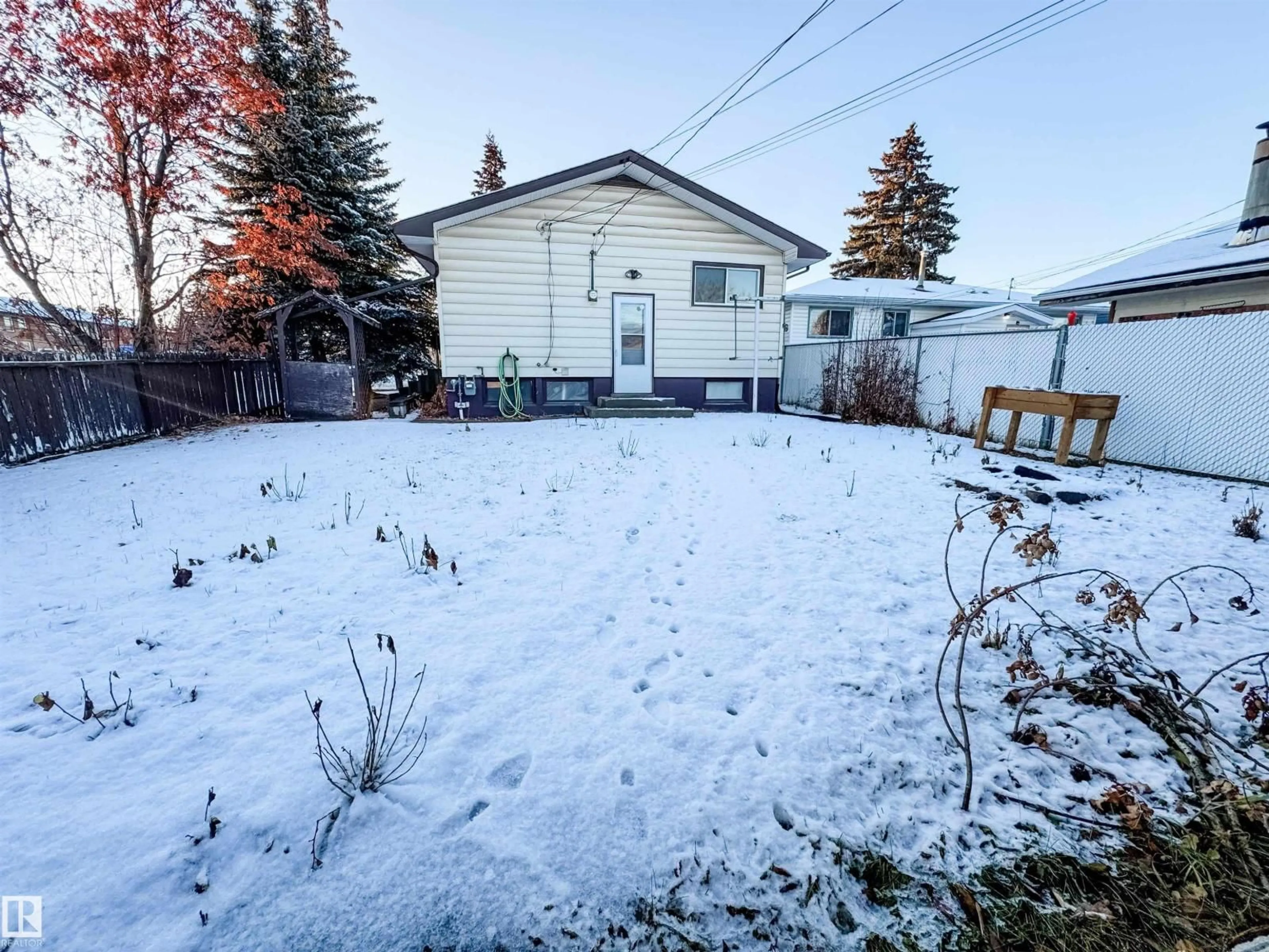 A pic from outside/outdoor area/front of a property/back of a property/a pic from drone, street for 4508 50 AV, Drayton Valley Alberta T7A1C6