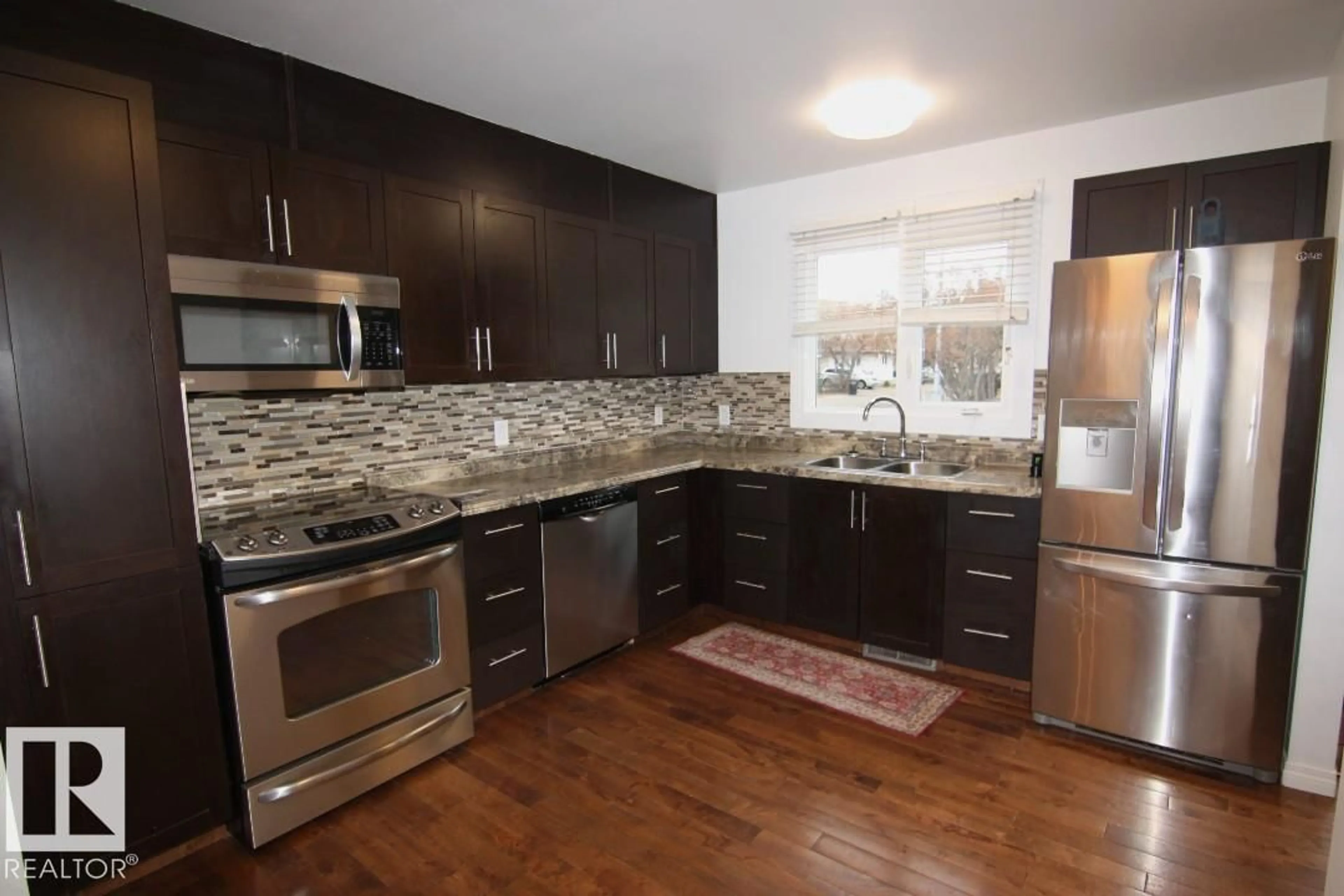 Open concept kitchen, unknown for NW - 9541A 180A ST, Edmonton Alberta T5T2Z4