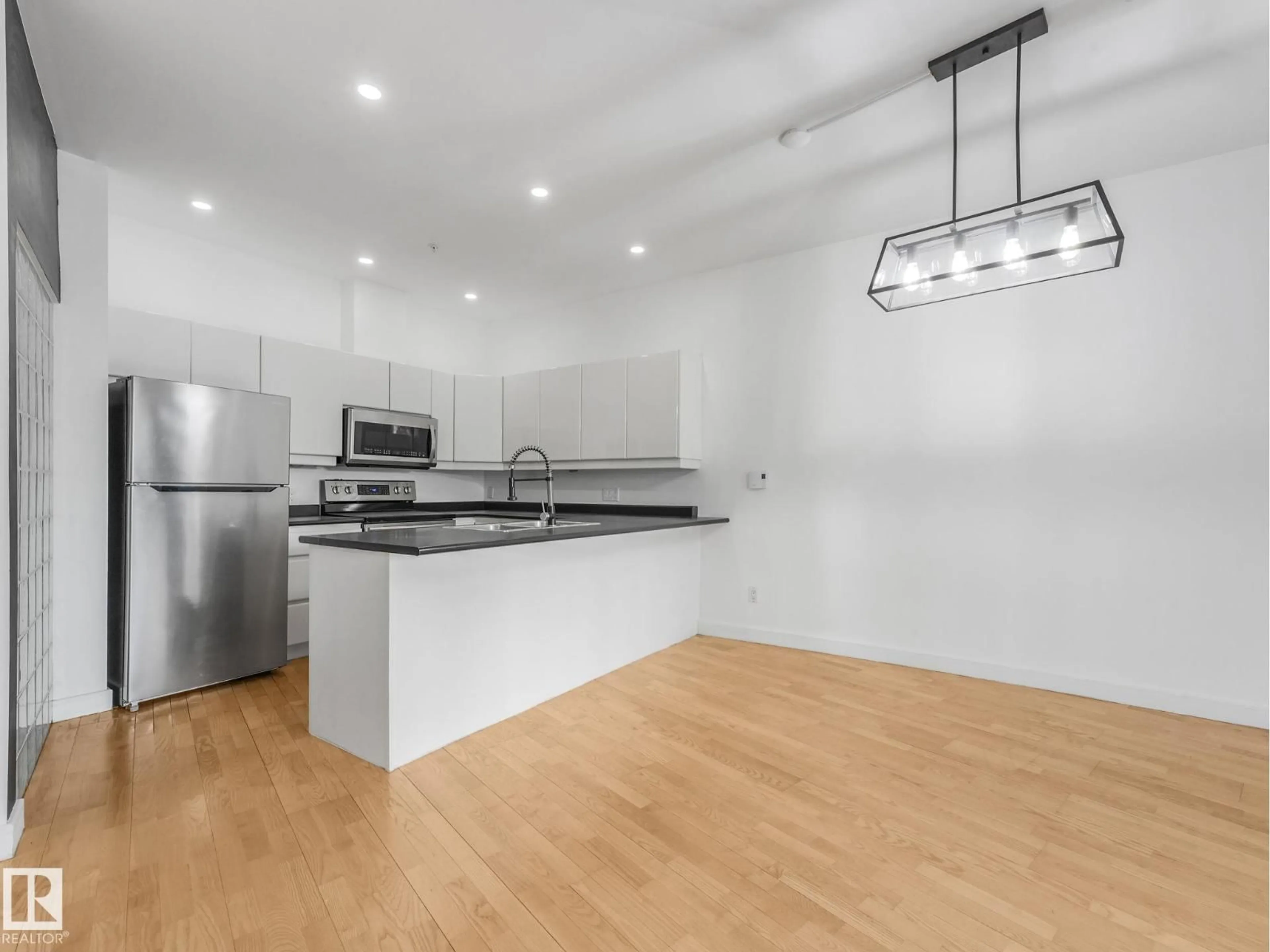 Open concept kitchen, unknown for 105 - 11415 100 AV, Edmonton Alberta T5K0J5