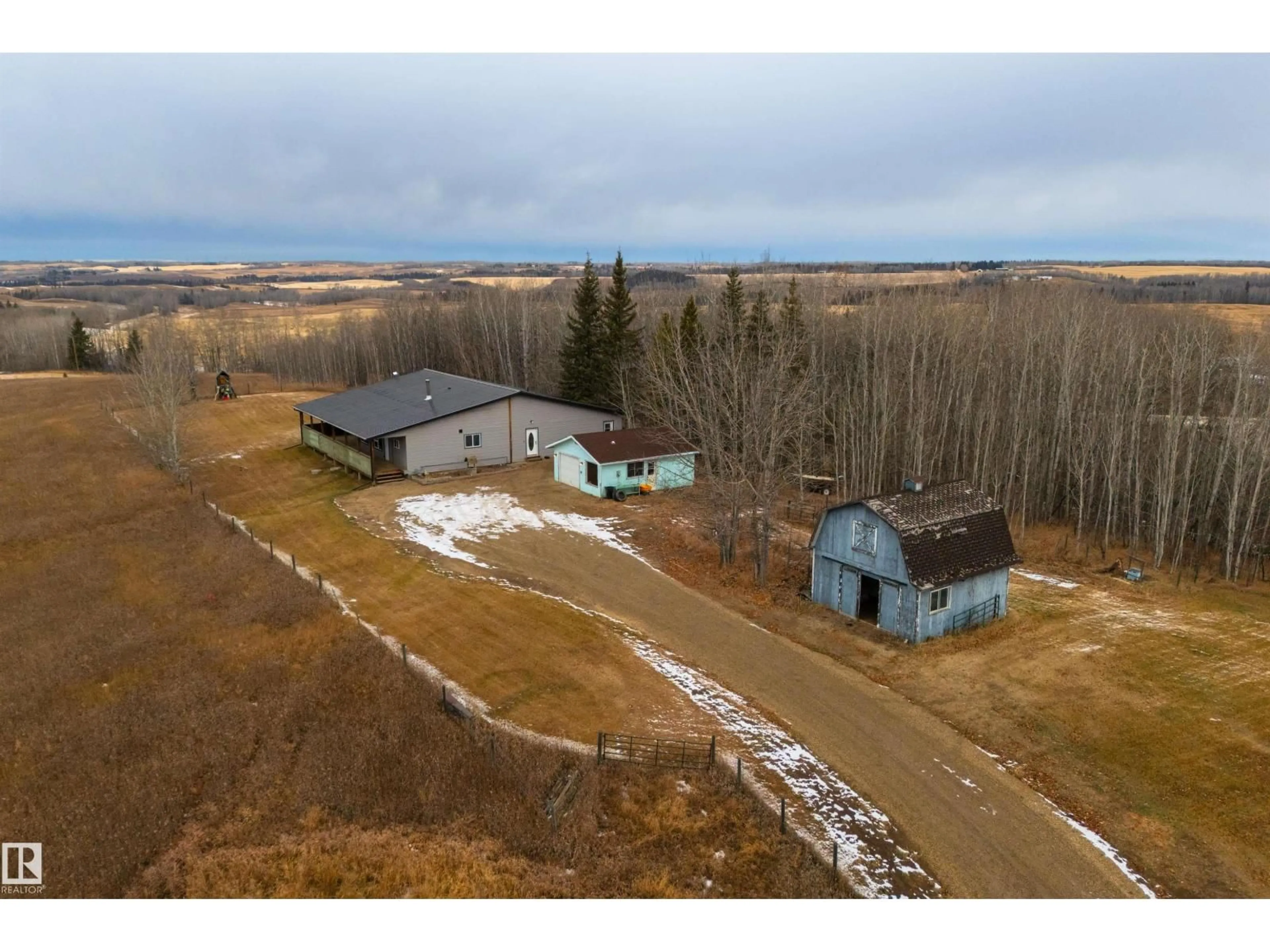 A pic from outside/outdoor area/front of a property/back of a property/a pic from drone, mountain view for 51328 RGE ROAD 24, Rural Parkland County Alberta T7Y2K4