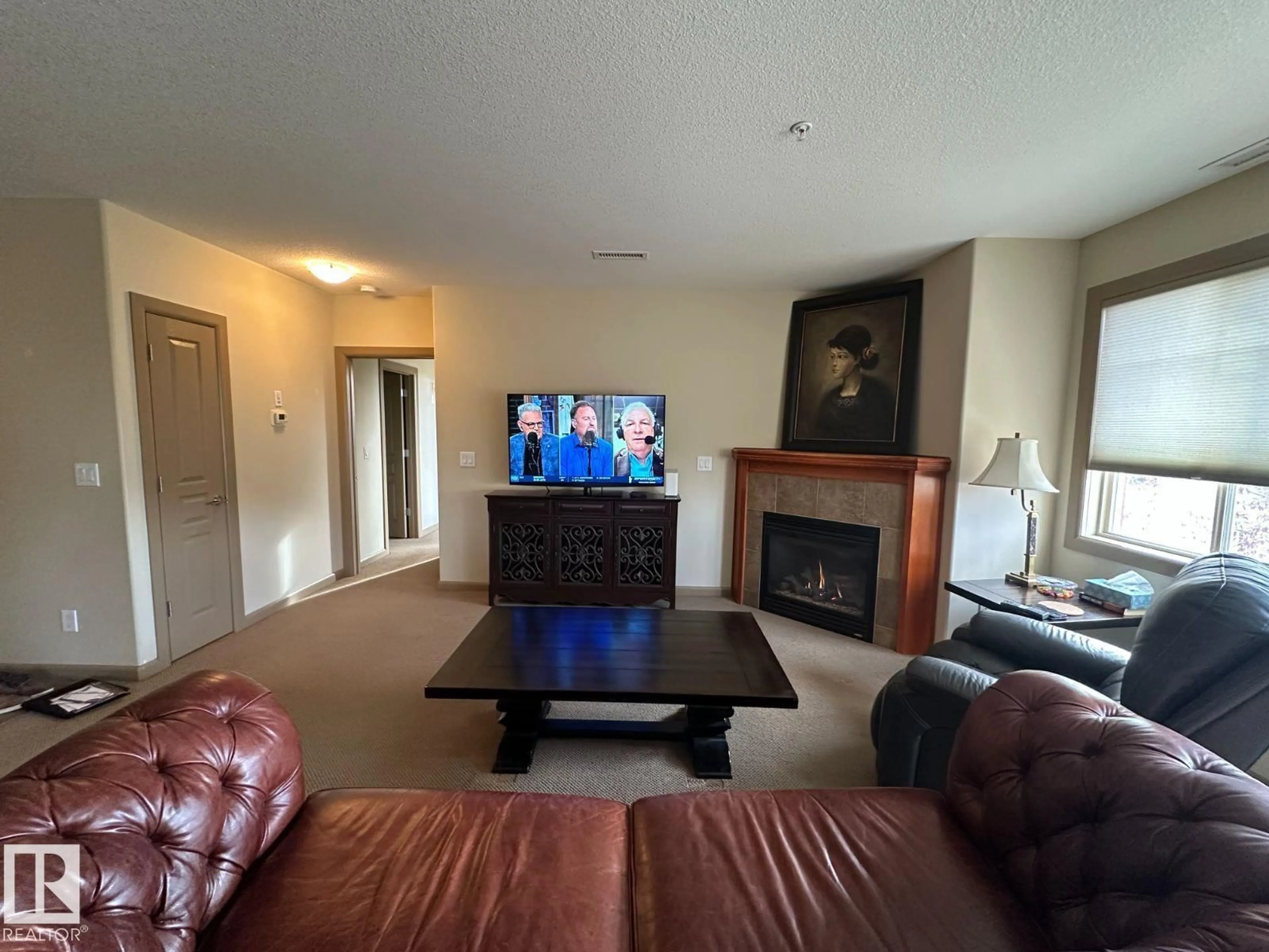 Living room with furniture, unknown for 500 - 216 PALISADES WY, Sherwood Park Alberta T8H0H7
