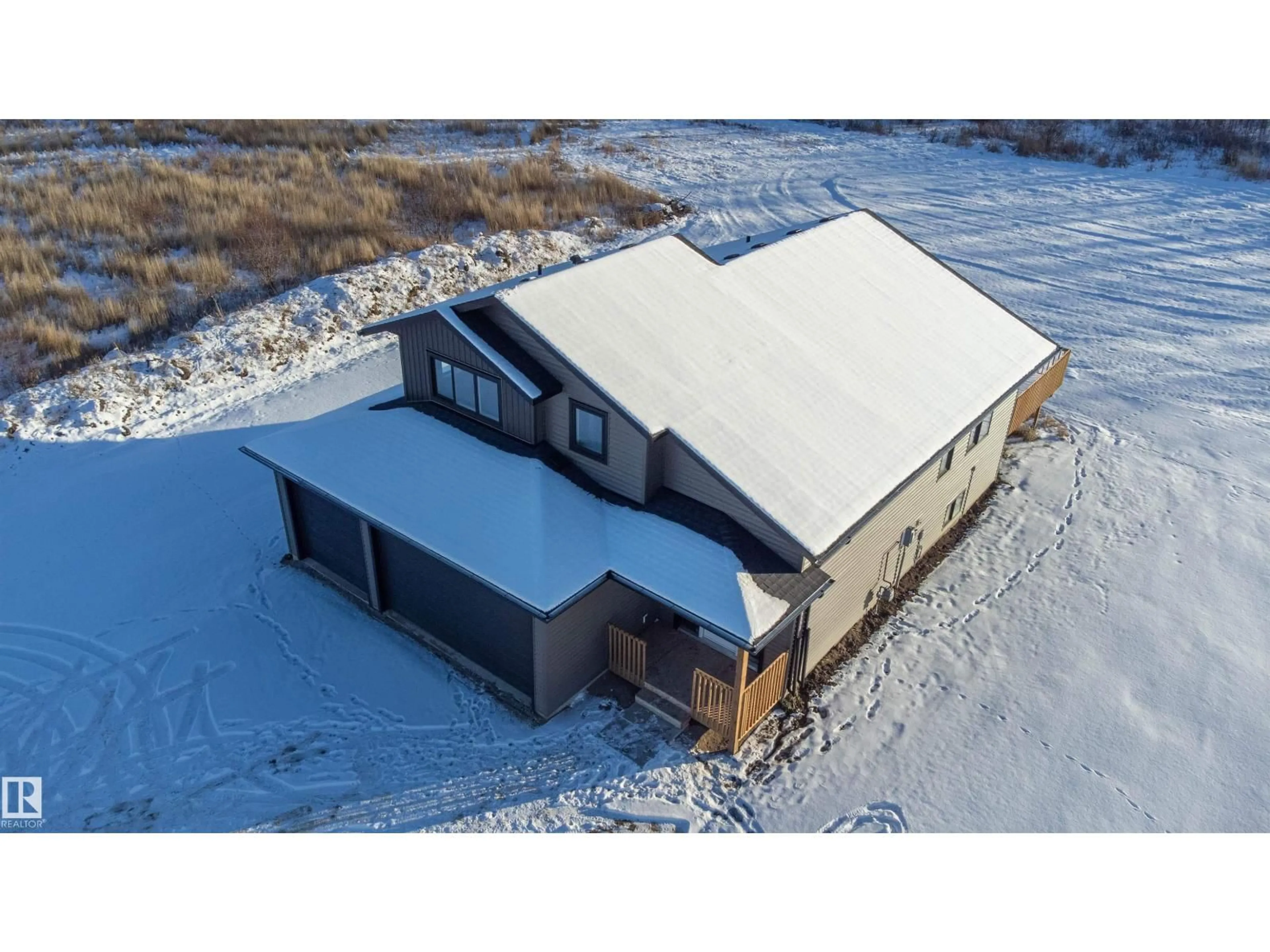 A pic from outside/outdoor area/front of a property/back of a property/a pic from drone, building for 113 - 62429 RR 420A, Rural Bonnyville M.D. Alberta T9M1P2