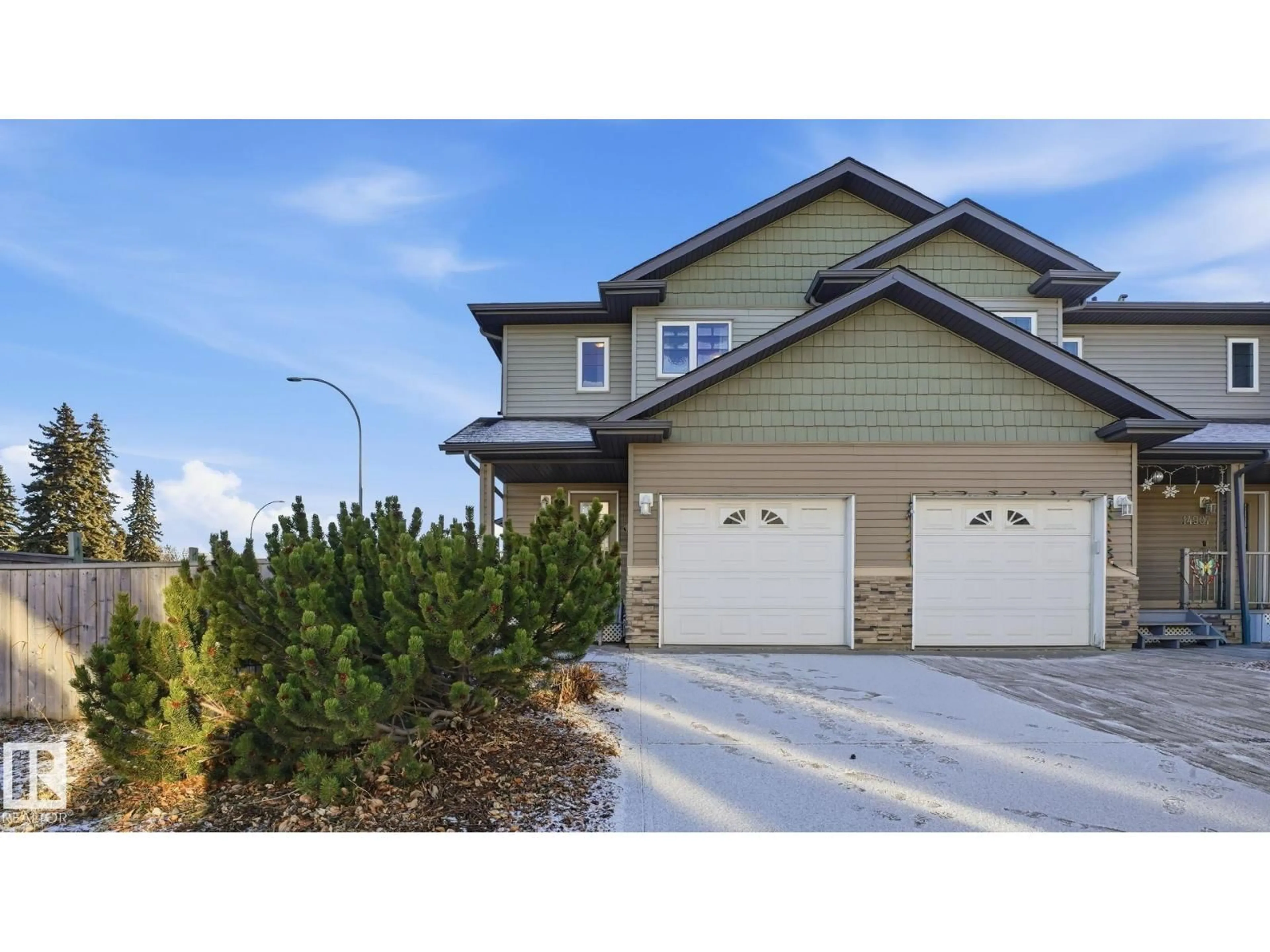 Home with vinyl exterior material, street for 14903 109 AV, Edmonton Alberta T5P1M5