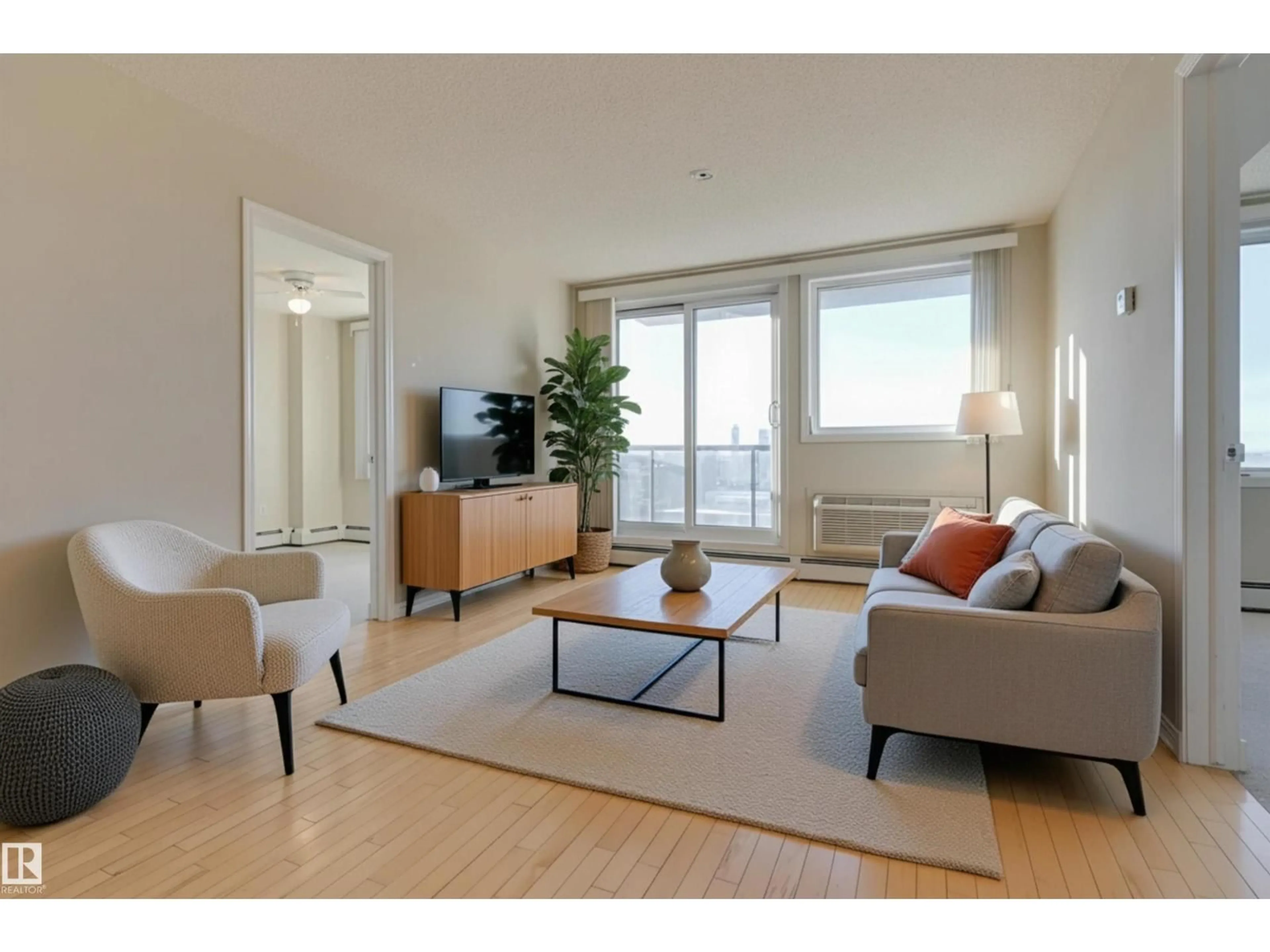 Living room with furniture, wood/laminate floor for 10303 - 1807 105 ST NW, Edmonton Alberta T5J5G3