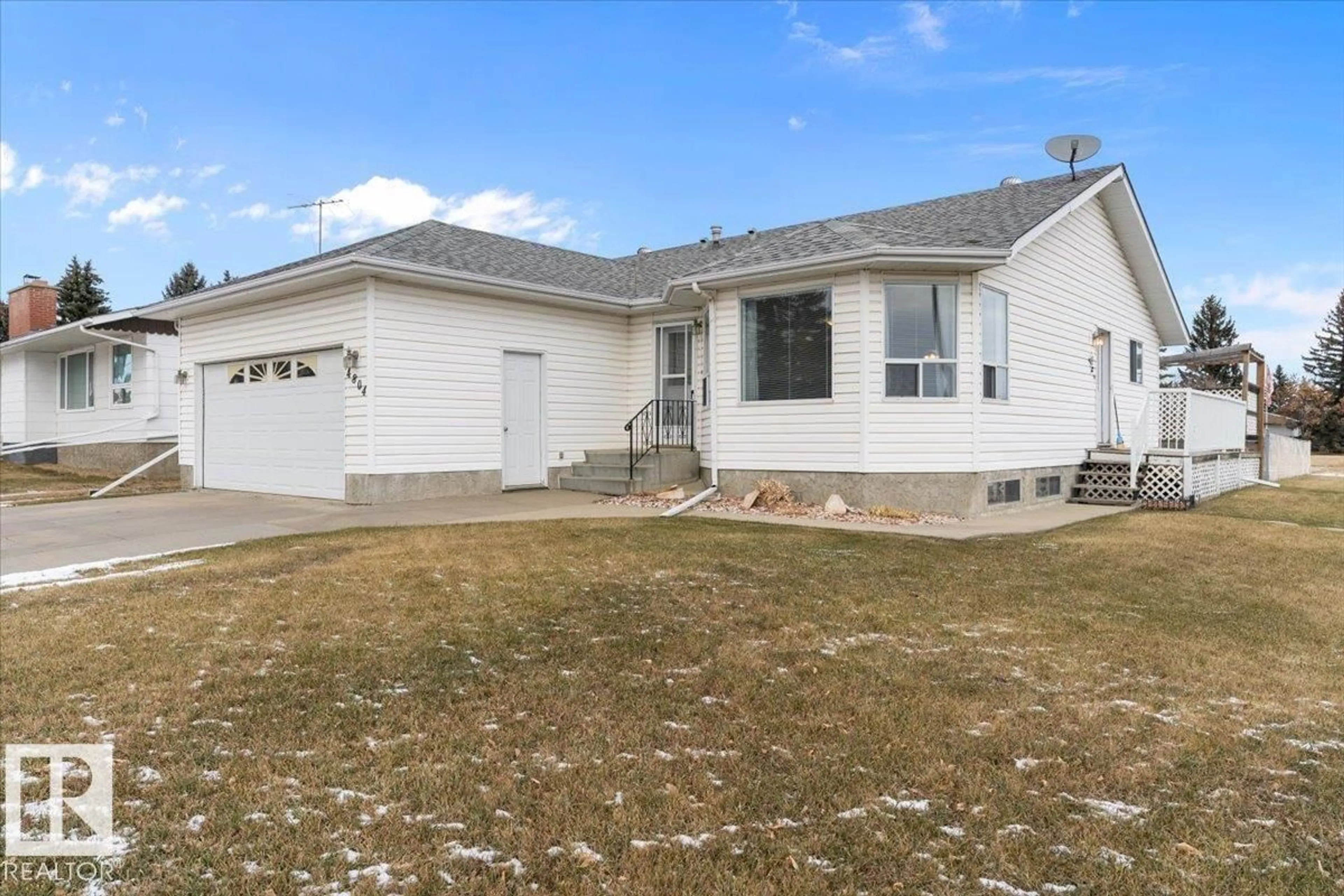 Home with vinyl exterior material, street for 4804 52 AV, Tofield Alberta T0B4J0