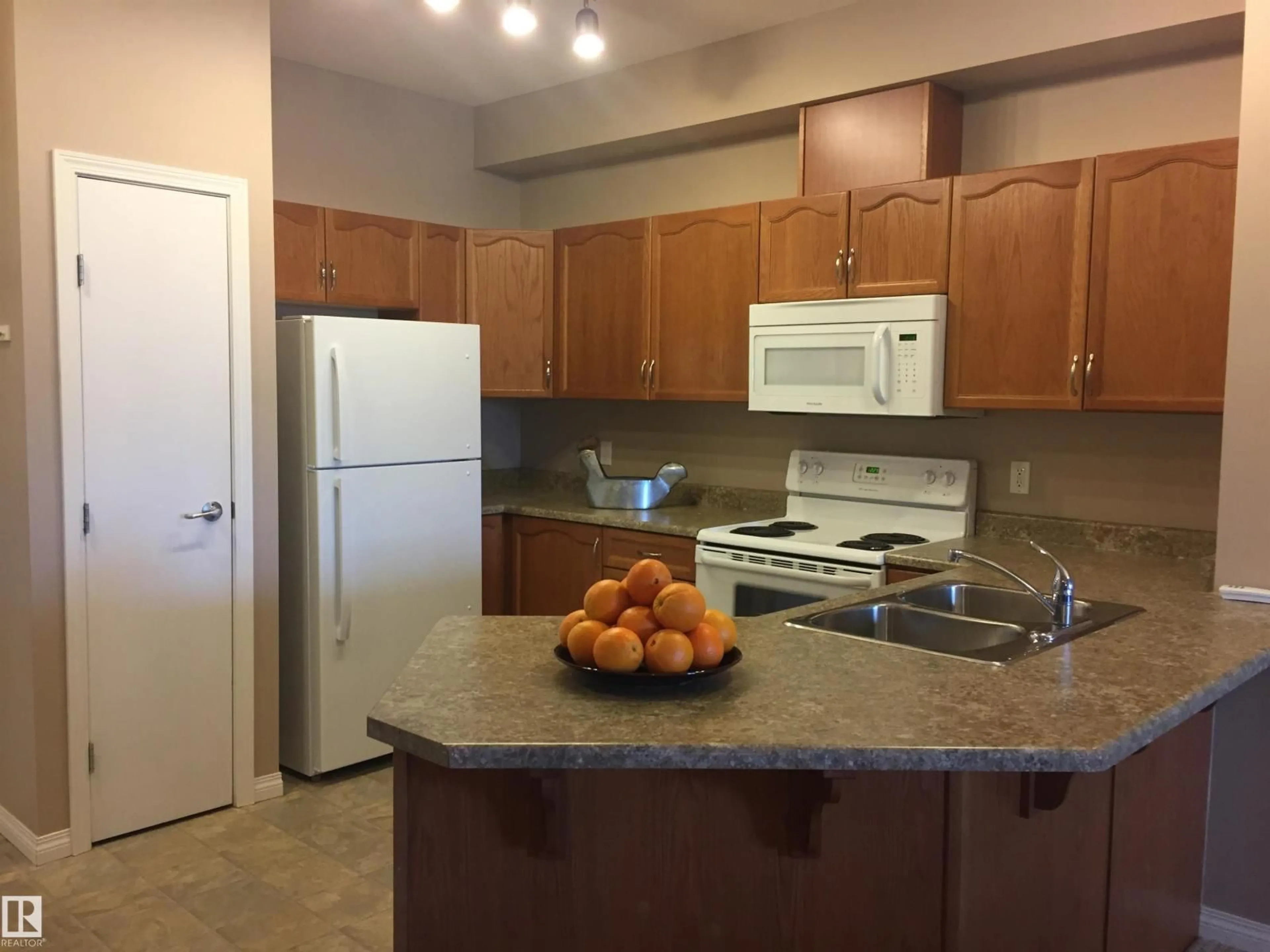Standard kitchen, unknown for #111 - 4316 139 AV, Edmonton Alberta T5Y0L1