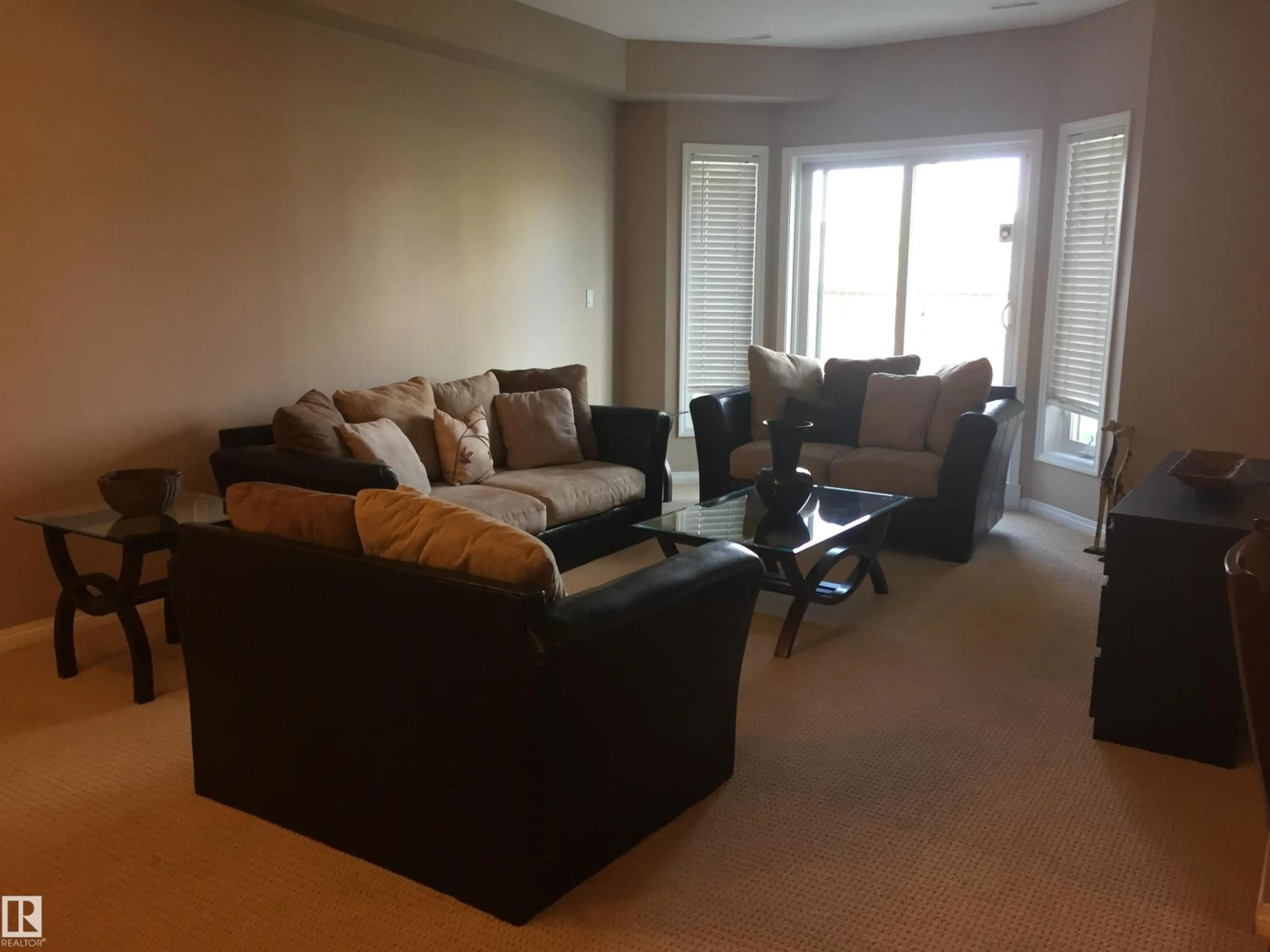 Living room with furniture, unknown for #111 - 4316 139 AV, Edmonton Alberta T5Y0L1
