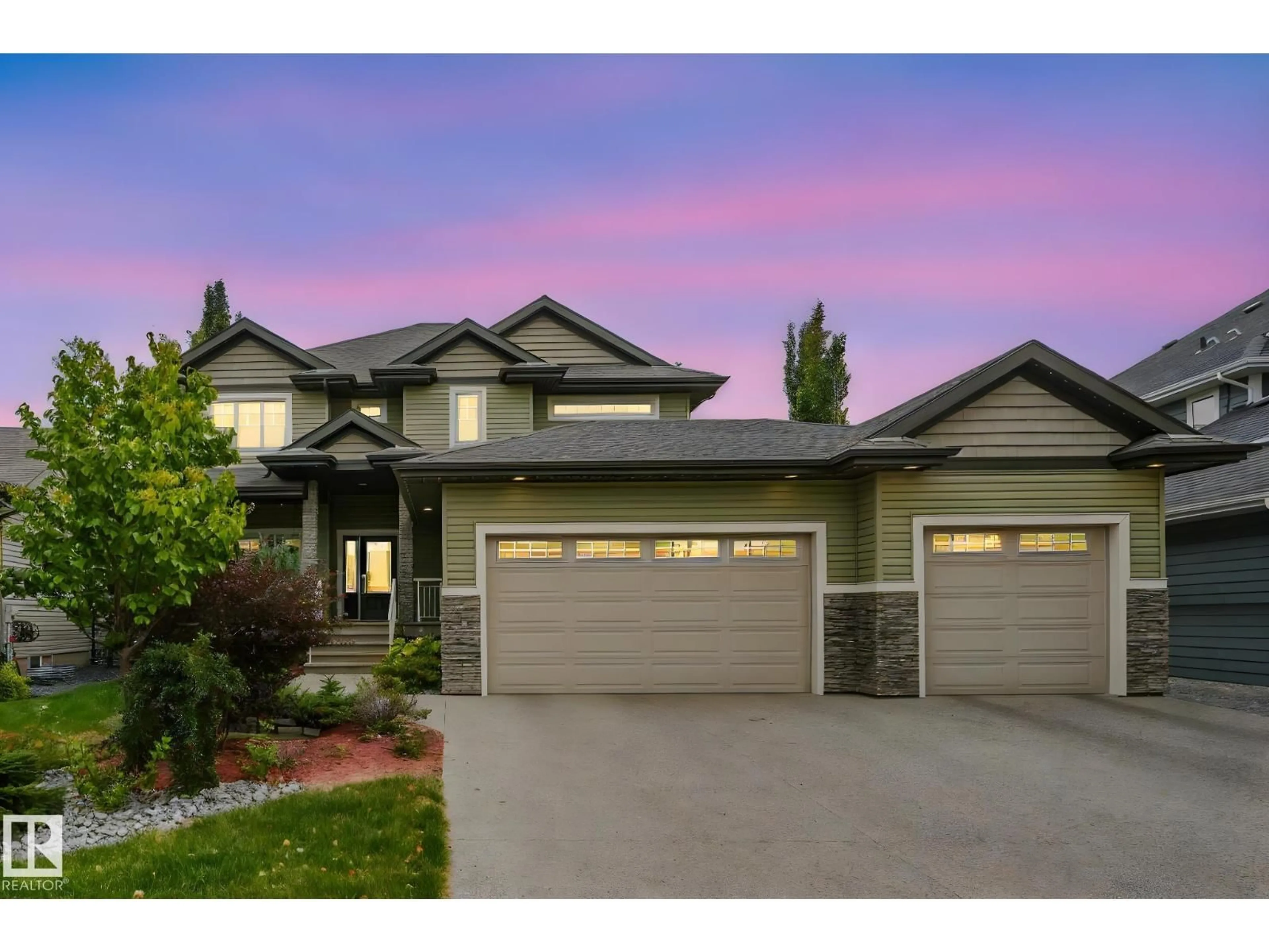 Home with vinyl exterior material, street for 2441 BOWEN WD, Edmonton Alberta T6W0E8