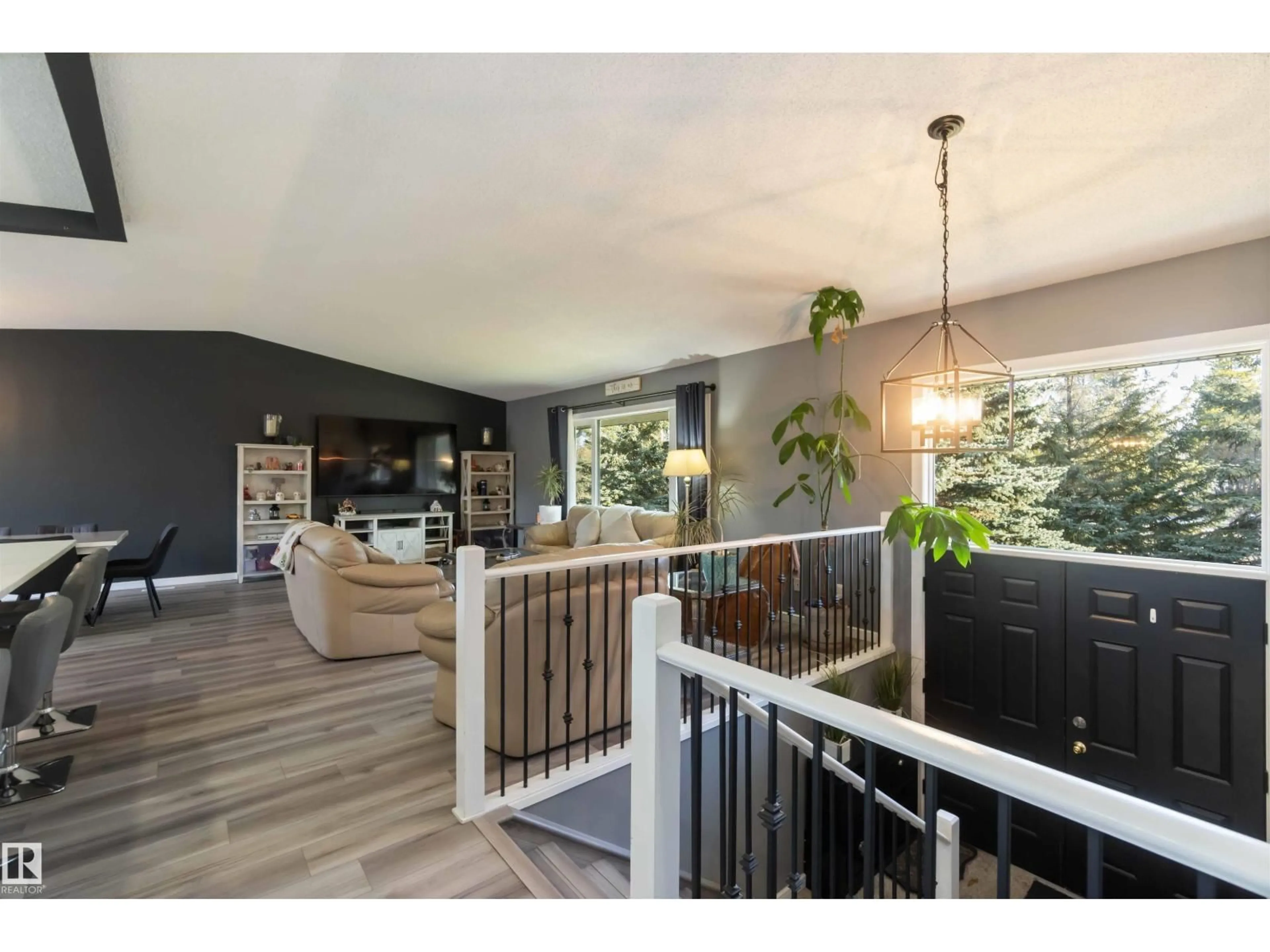 Open concept kitchen, wood/laminate floor for 121 TWP ROAD 514 ROAD, Rural Parkland County Alberta T7Y1G6