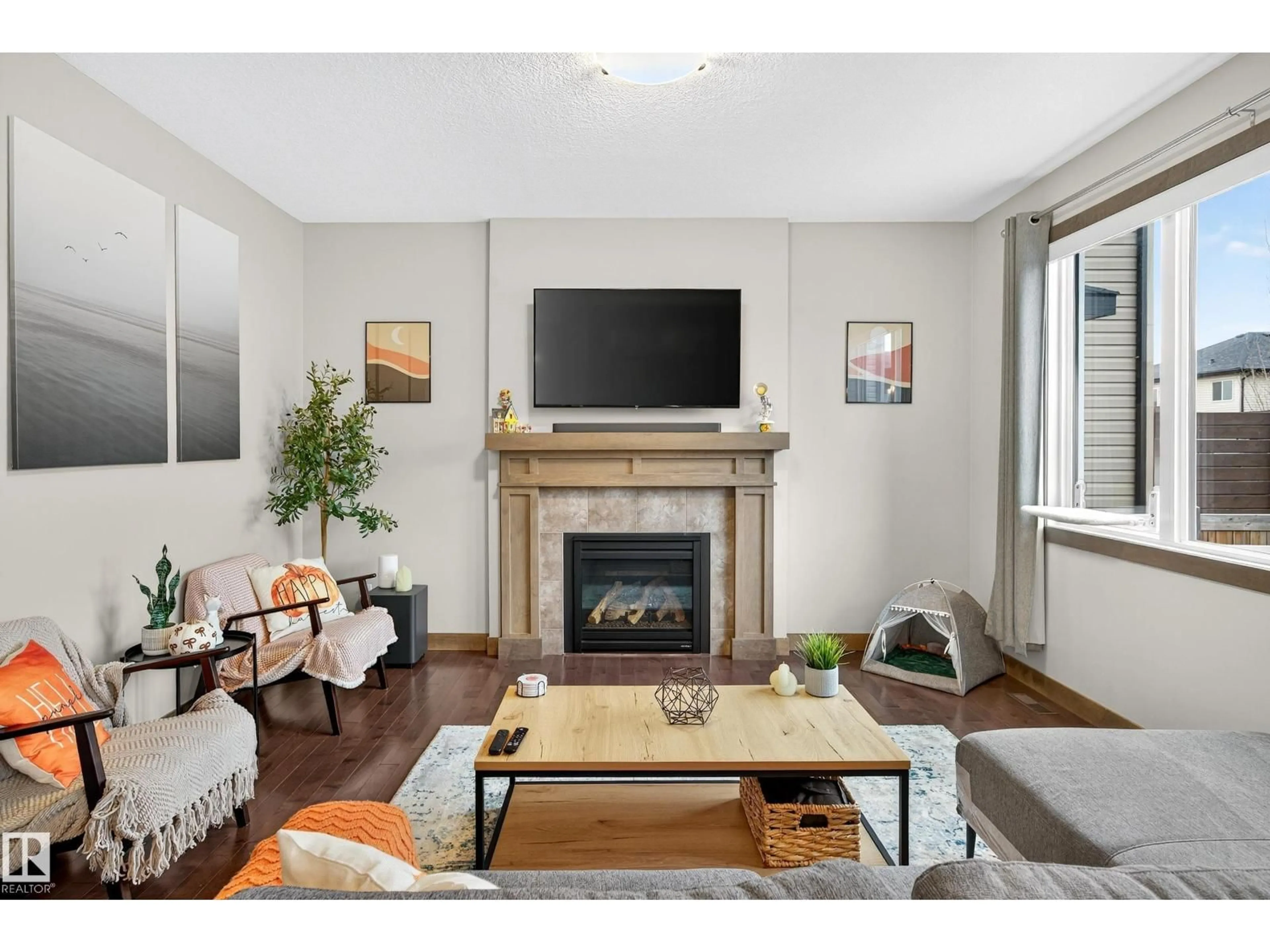 Living room with furniture, wood/laminate floor for 192 HENDERSON LI, Spruce Grove Alberta T7X0C7