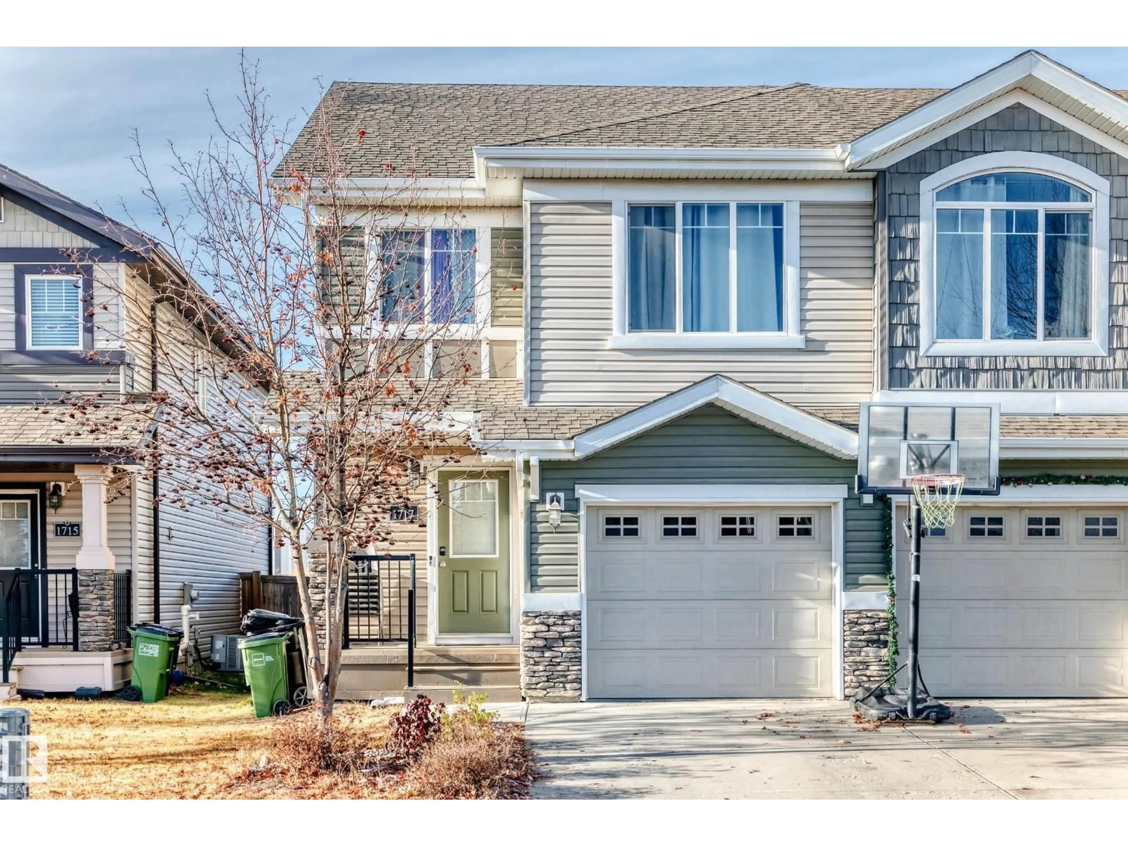 Home with vinyl exterior material, street for NW - 1717 HAMMOND CR, Edmonton Alberta T6M0N1