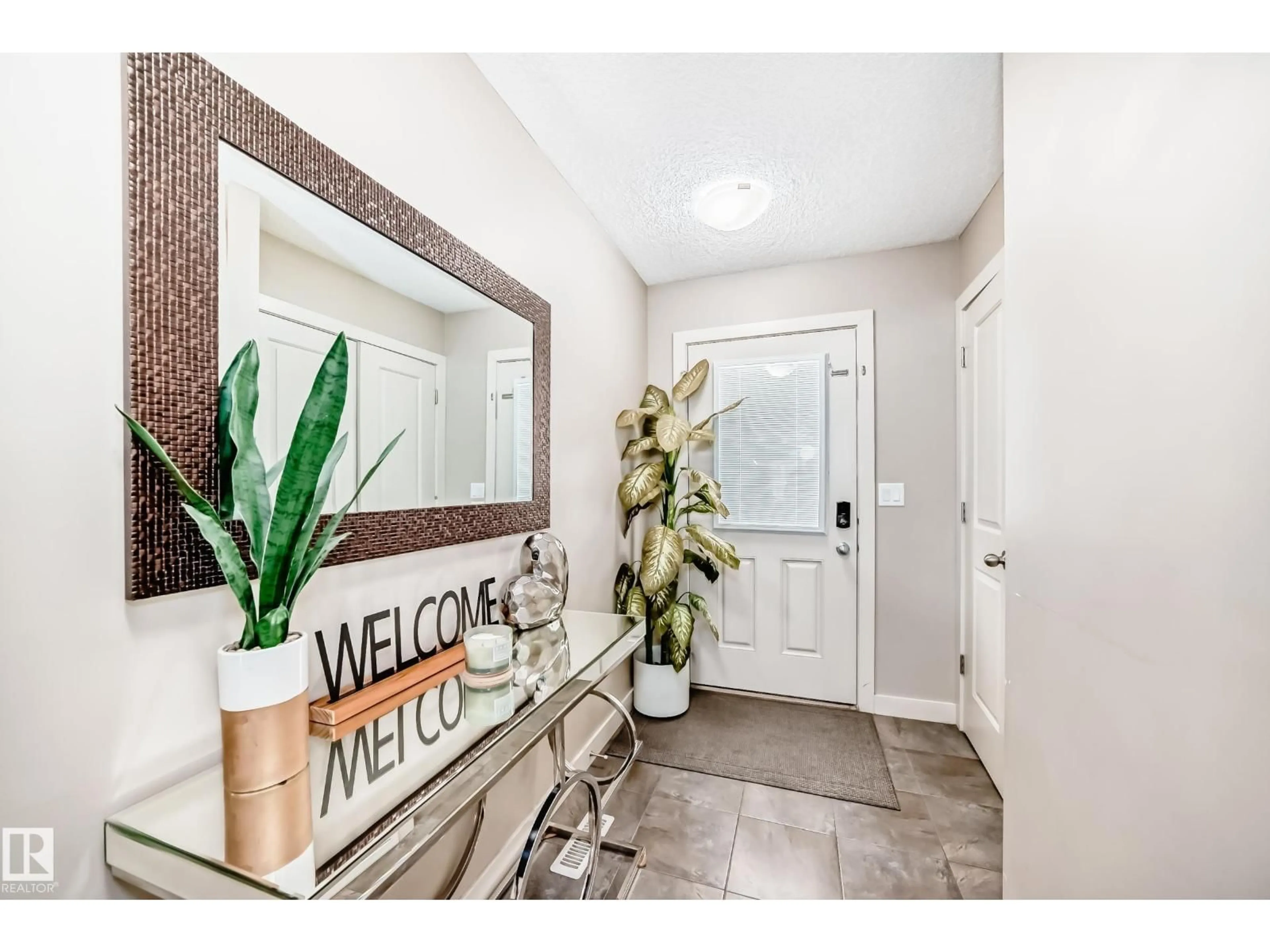 Indoor entryway for NW - 1717 HAMMOND CR, Edmonton Alberta T6M0N1