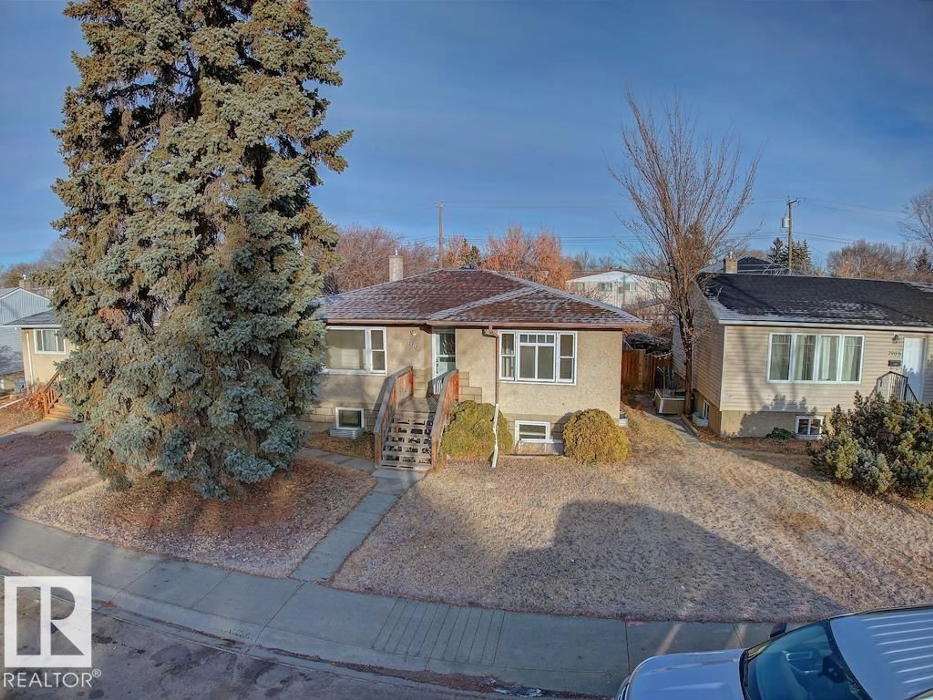 A pic from outside/outdoor area/front of a property/back of a property/a pic from drone, street for 7912 82 AV, Edmonton Alberta T6C0Y2