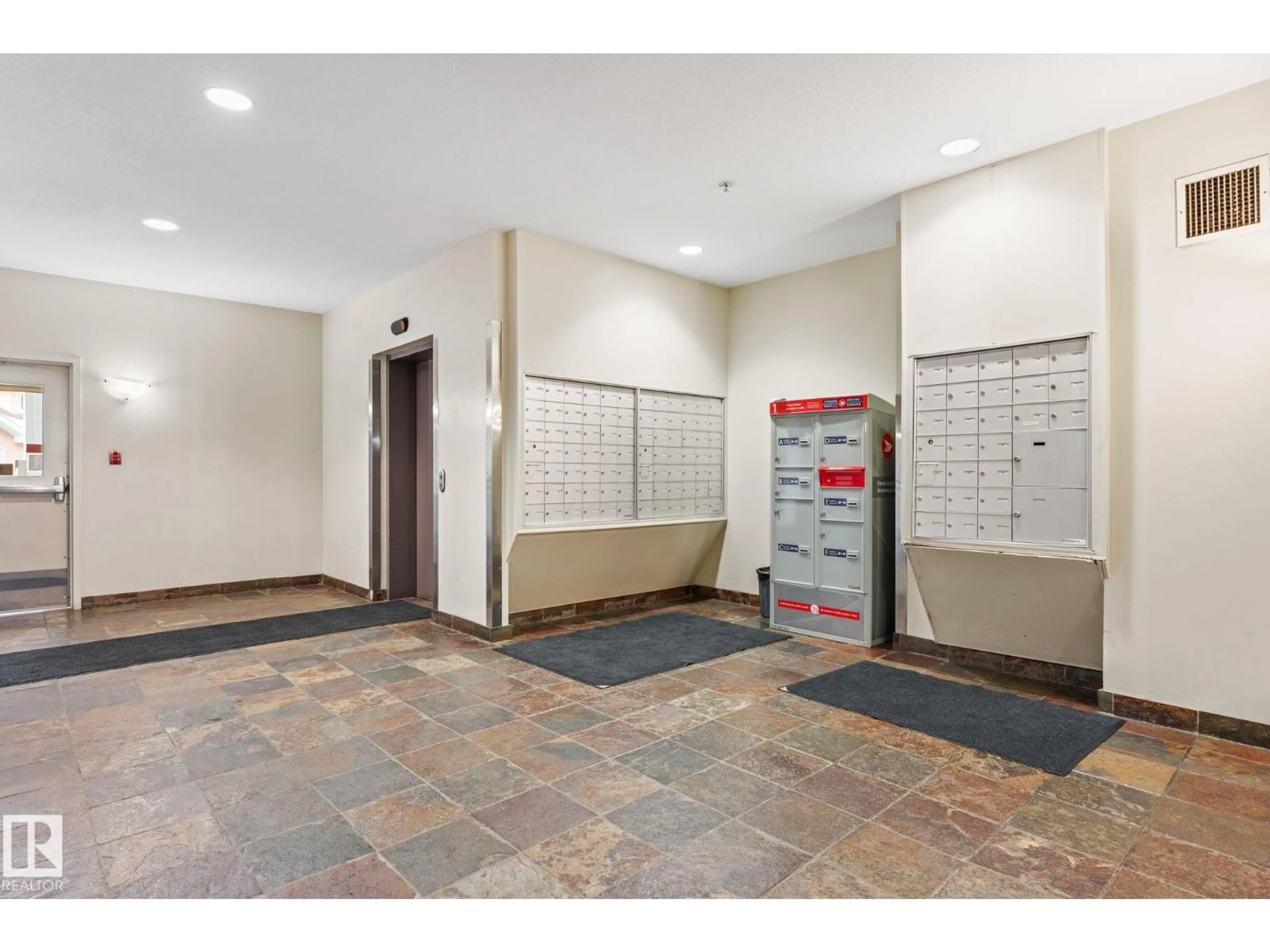 Indoor foyer for #324 - 4304 139 AV, Edmonton Alberta T5Y0H6