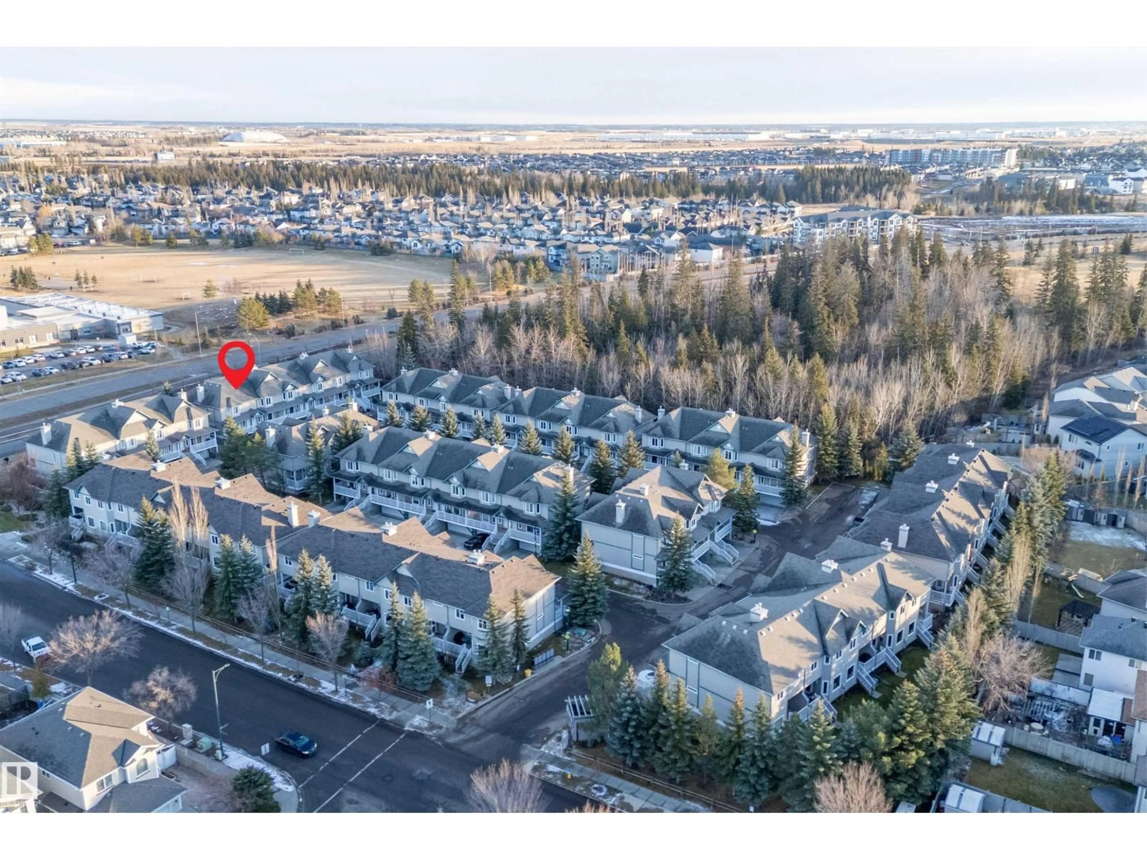 A pic from outside/outdoor area/front of a property/back of a property/a pic from drone, unknown for #17 - 903 RUTHERFORD RD, Edmonton Alberta T6W1N9