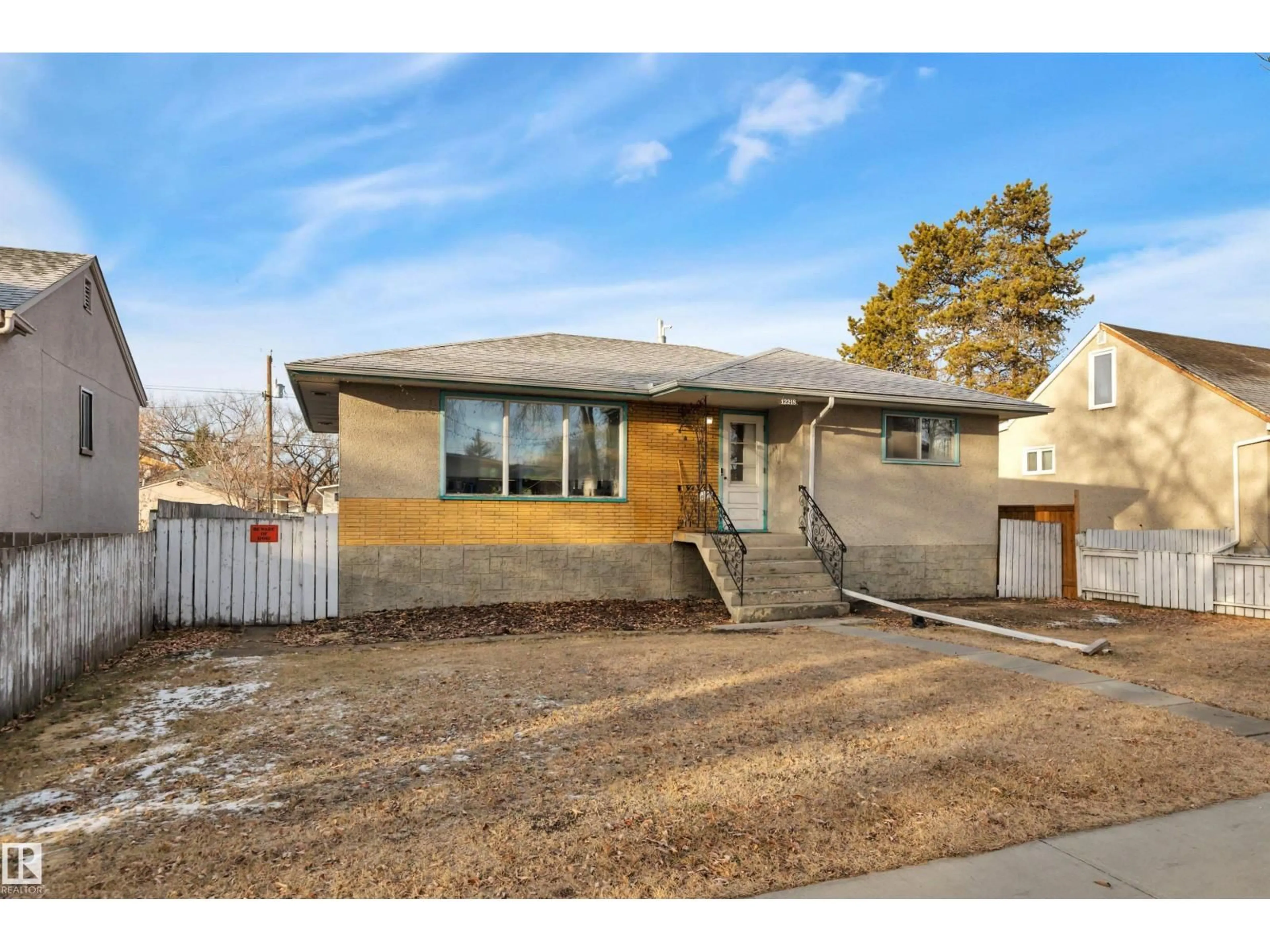 Home with brick exterior material, street for 12218 83 ST, Edmonton Alberta T5B3A2
