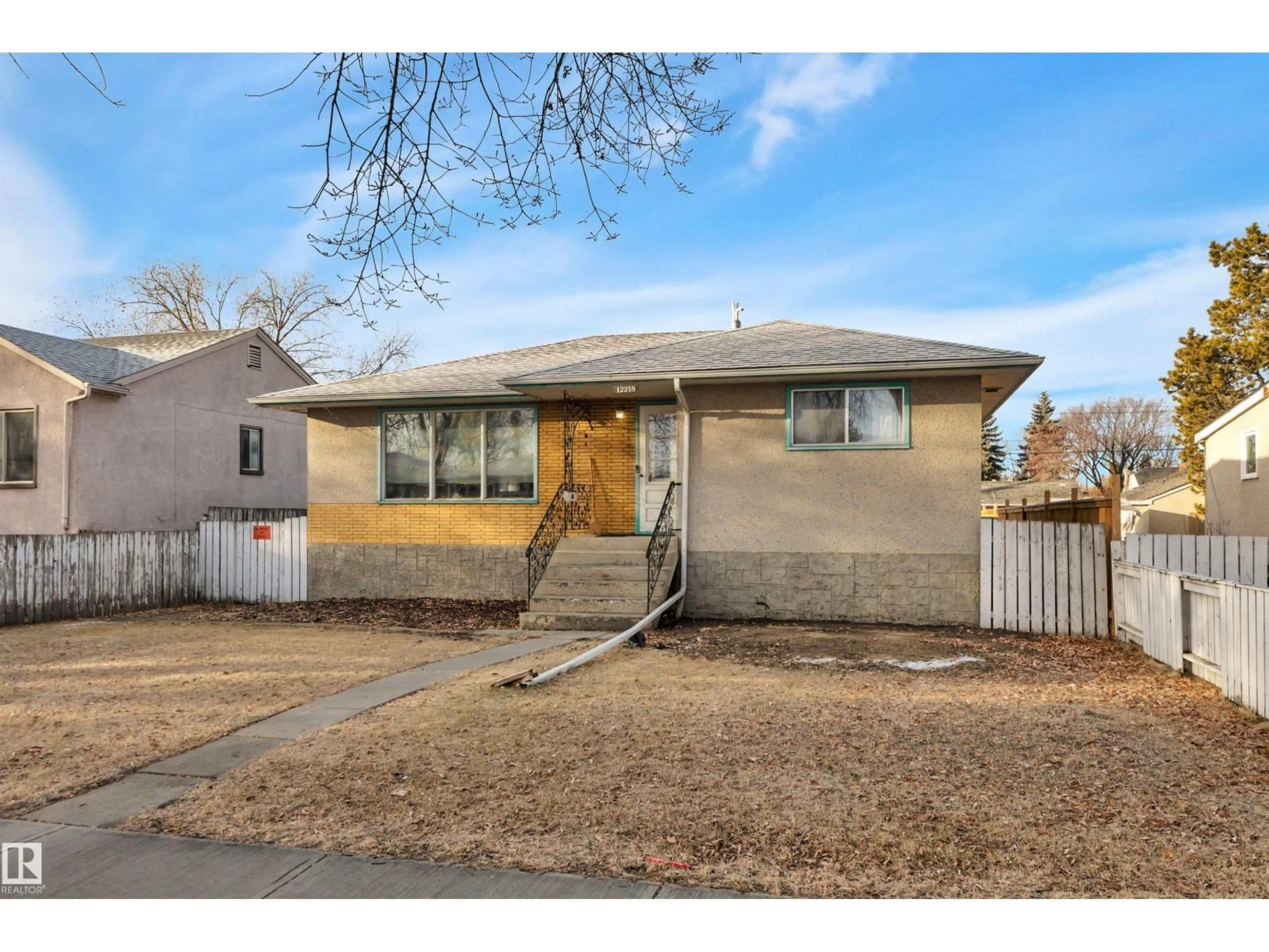 Home with brick exterior material, street for 12218 83 ST, Edmonton Alberta T5B3A2