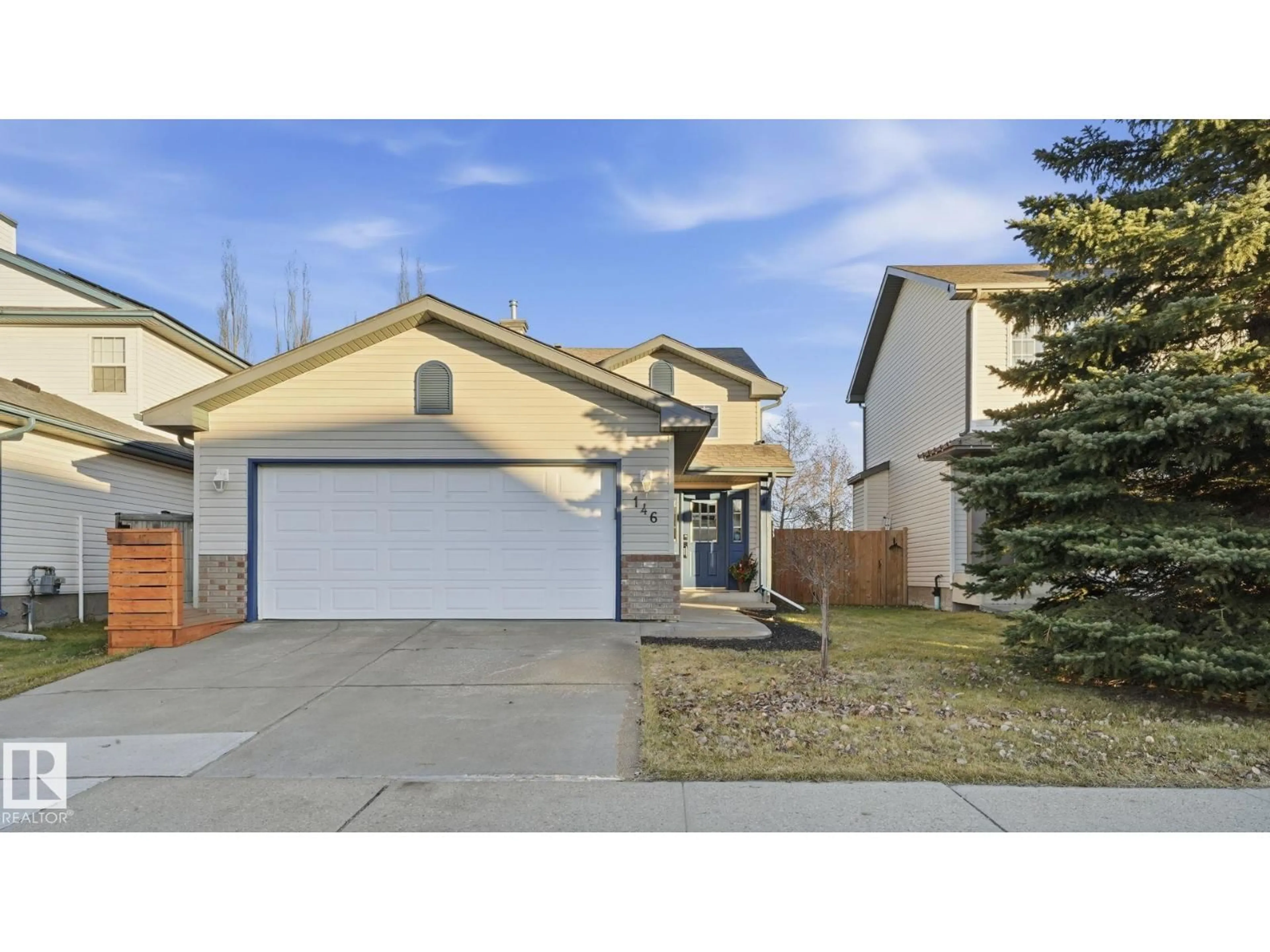 Home with vinyl exterior material, street for 146 LAKELAND DR, Spruce Grove Alberta T7X4A5