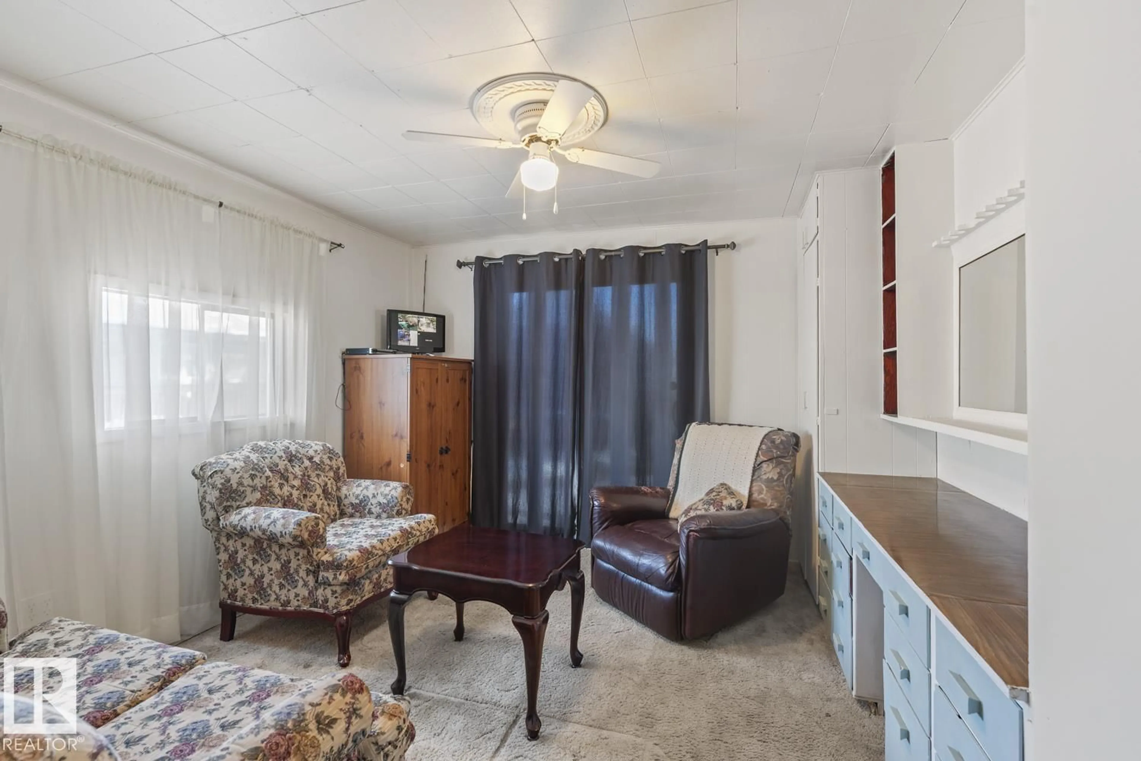 Living room with furniture, unknown for 5321 57 ST, Cold Lake Alberta T9M1R9