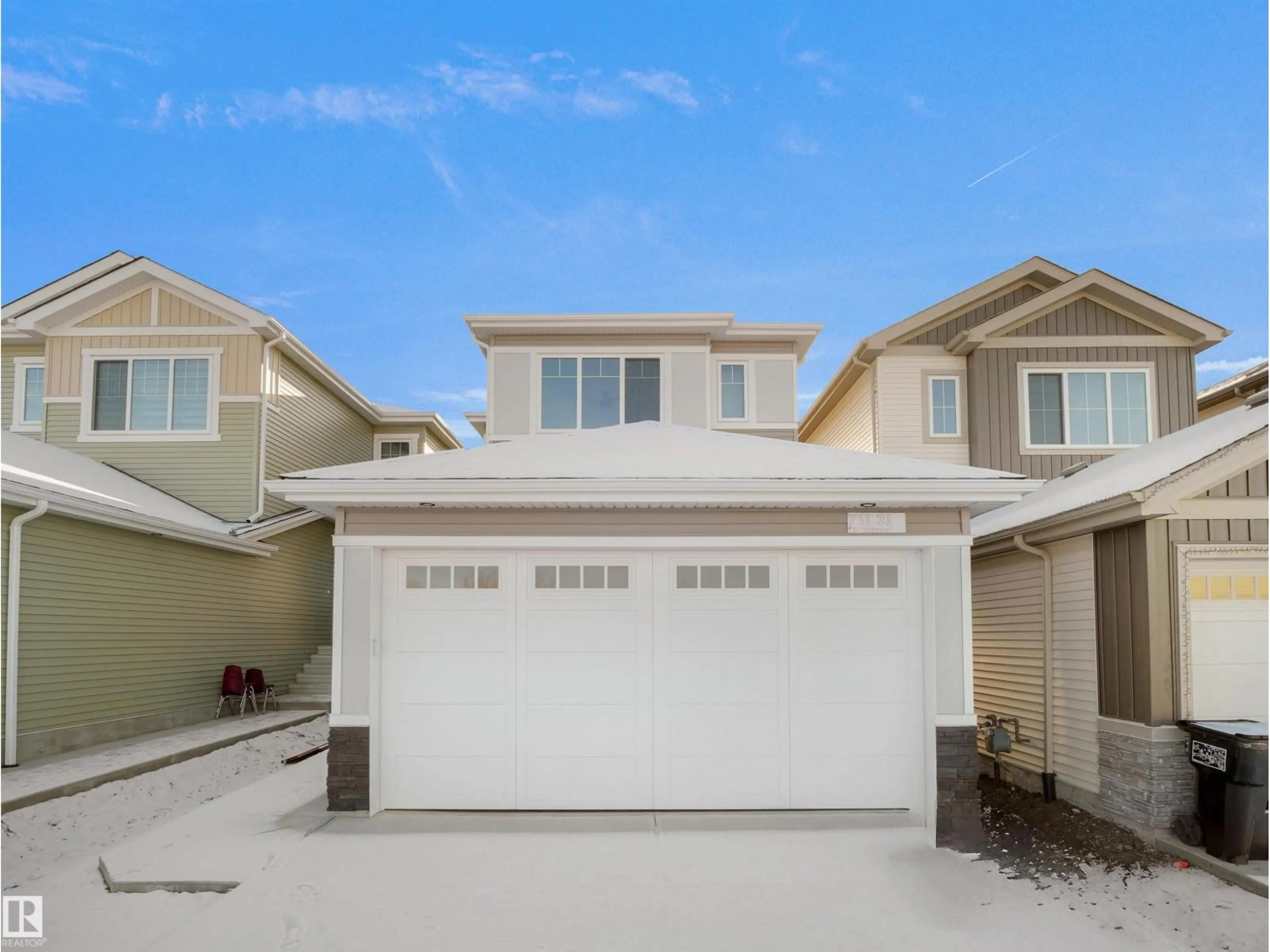 Home with vinyl exterior material, street for 711 31 AV, Edmonton Alberta T6T2V6