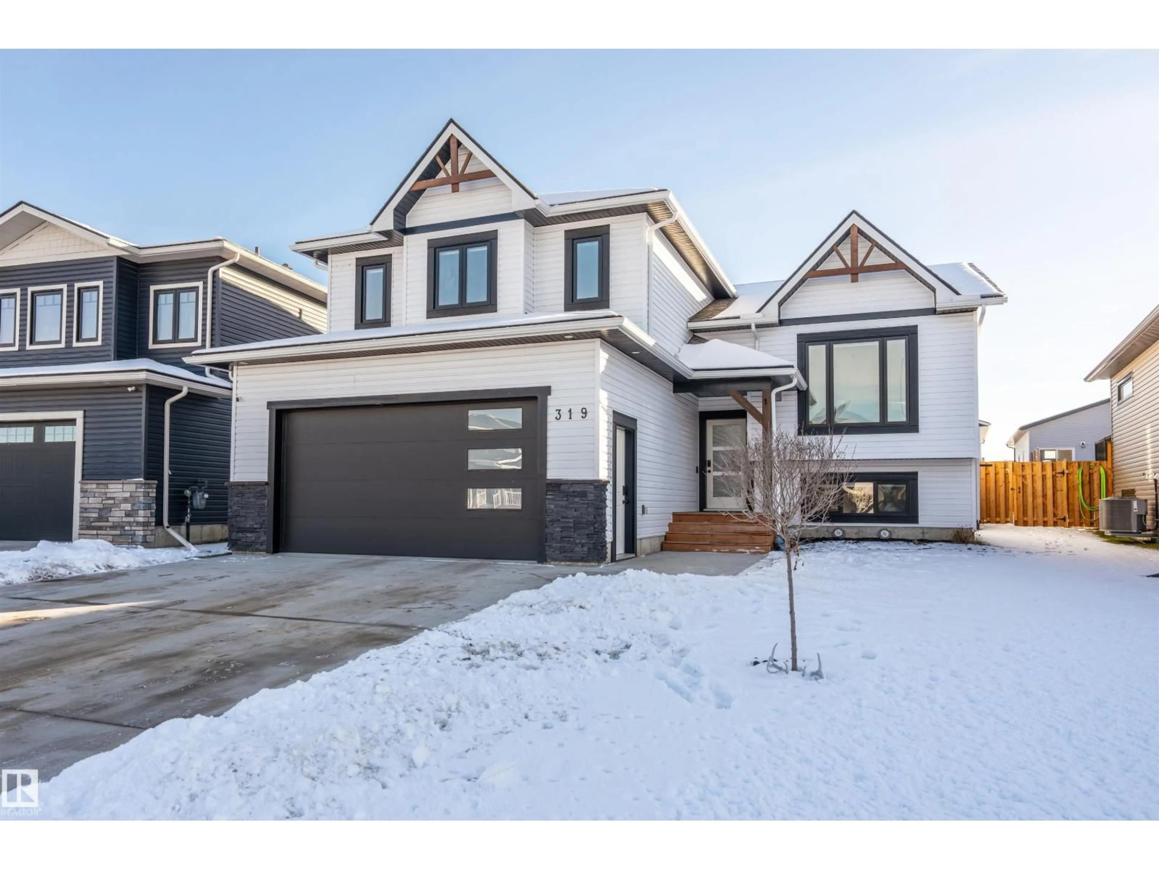 Home with brick exterior material, street for 319 WATERTON WY, Cold Lake Alberta T8M0L4