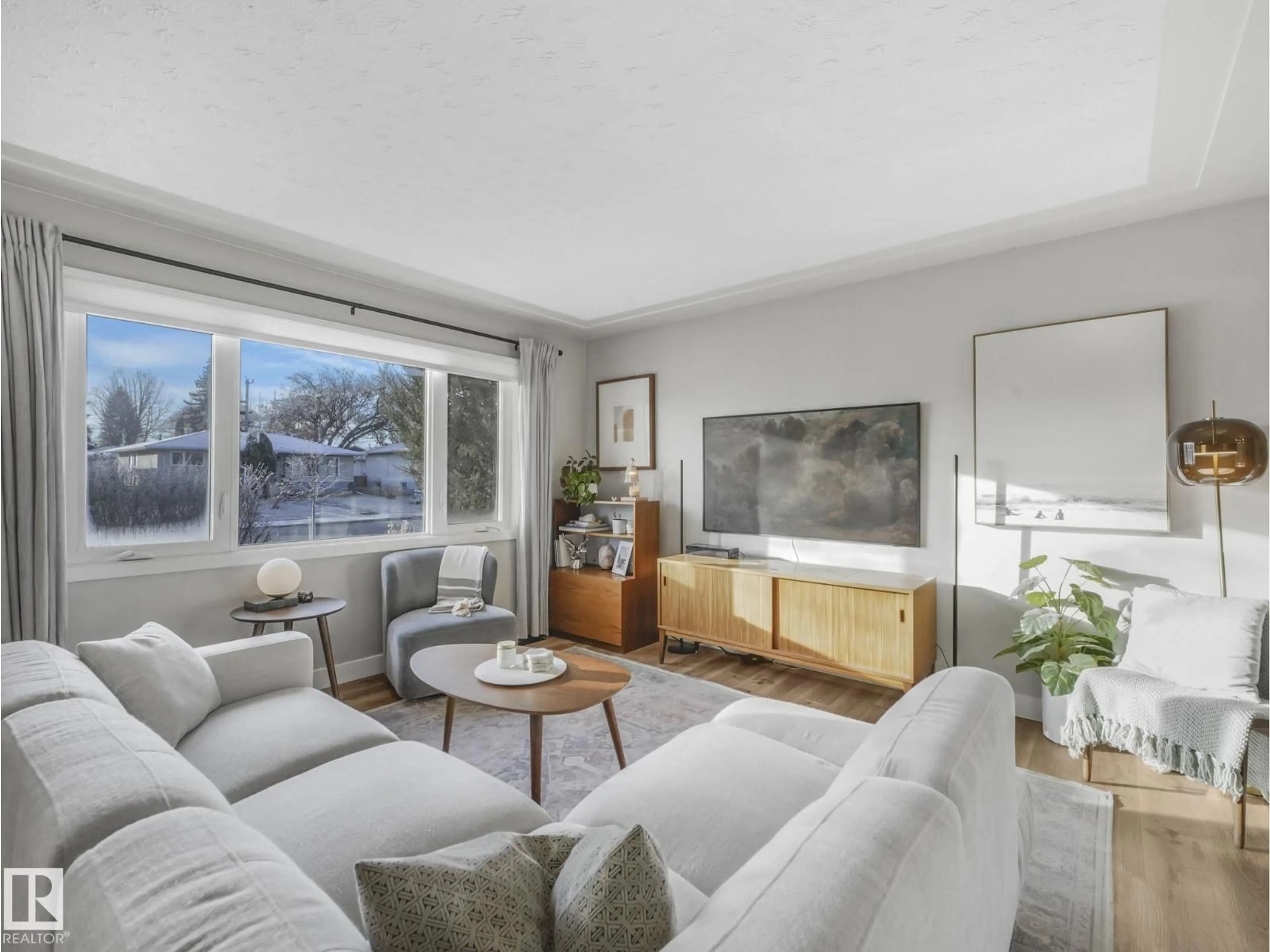 Living room with furniture, unknown for 10540 55 AV, Edmonton Alberta T6H0W7