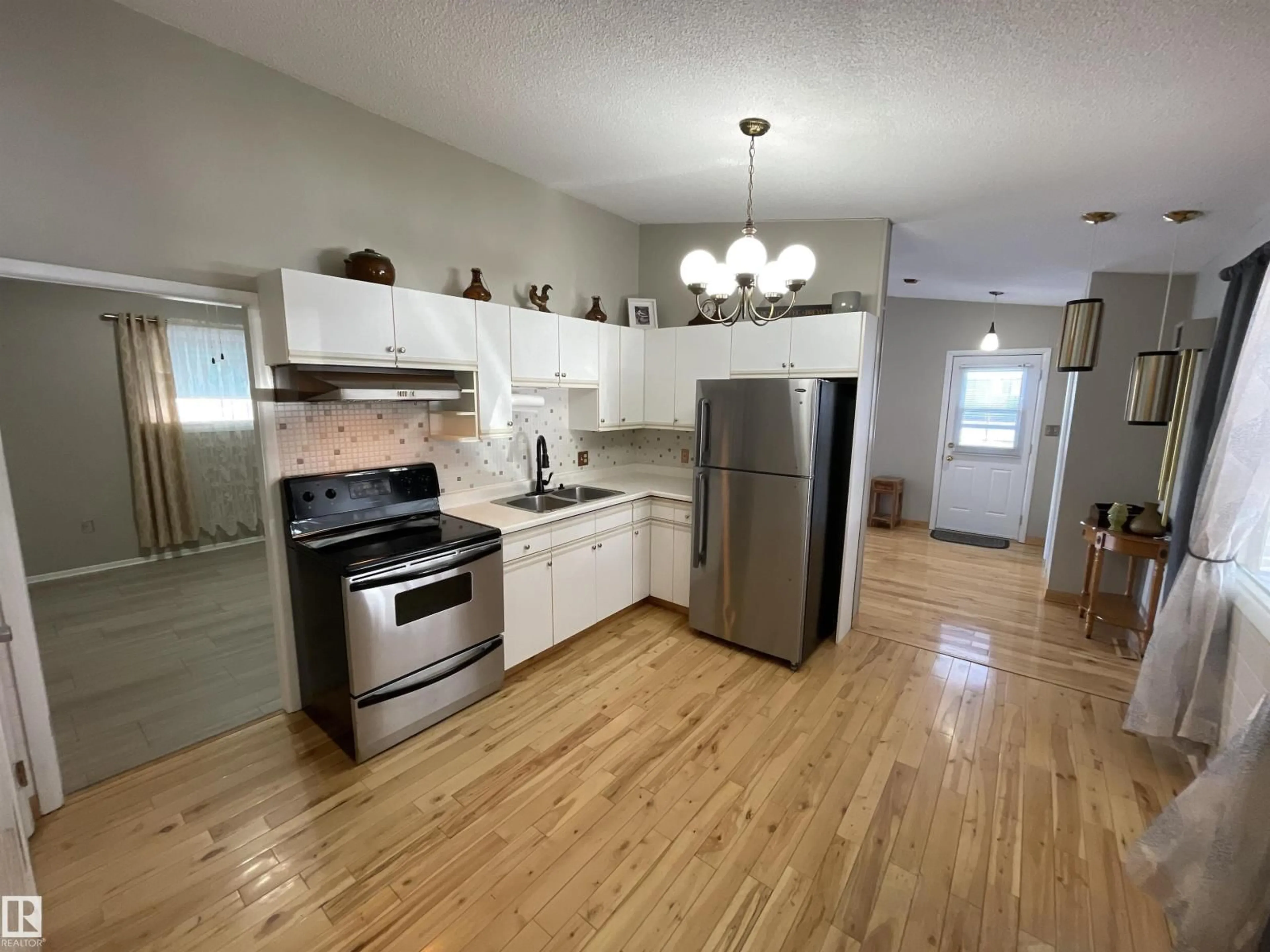 Open concept kitchen, unknown for 4902 55 ST, Bonnyville Town Alberta T9N1Z5