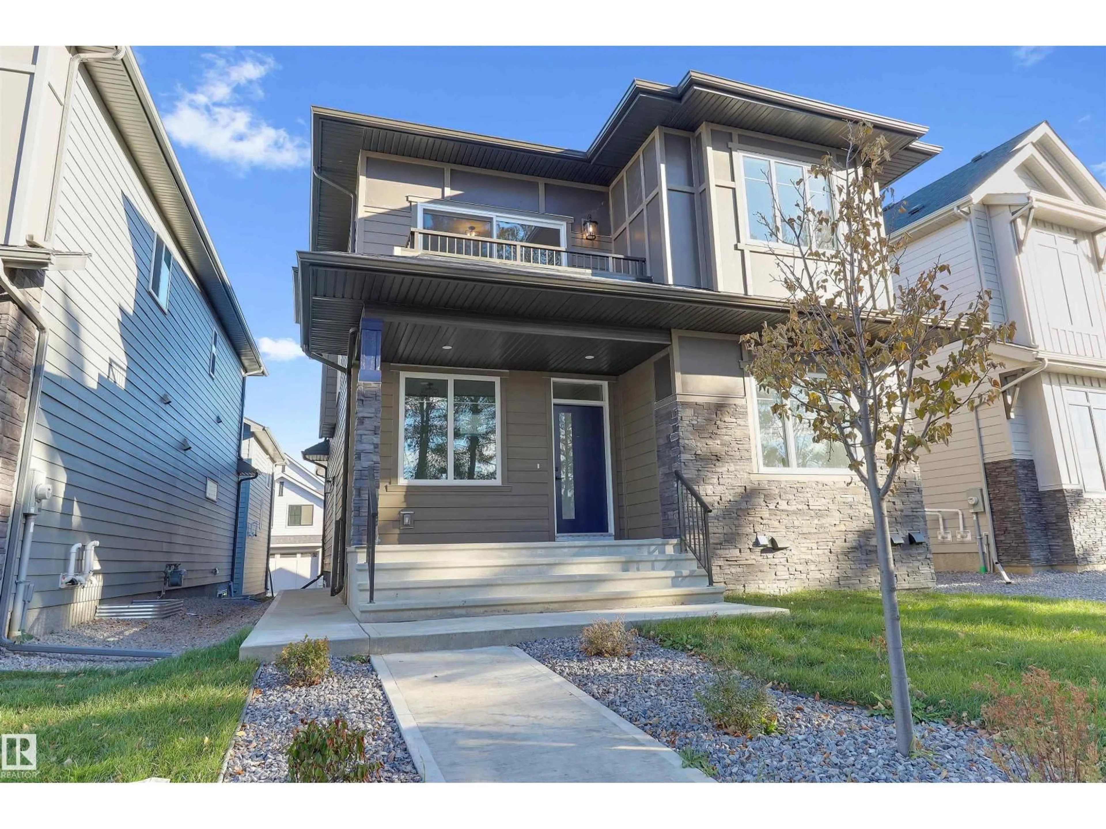 Home with vinyl exterior material, street for 6125 CRAWFORD DR SW, Edmonton Alberta T6W4L7