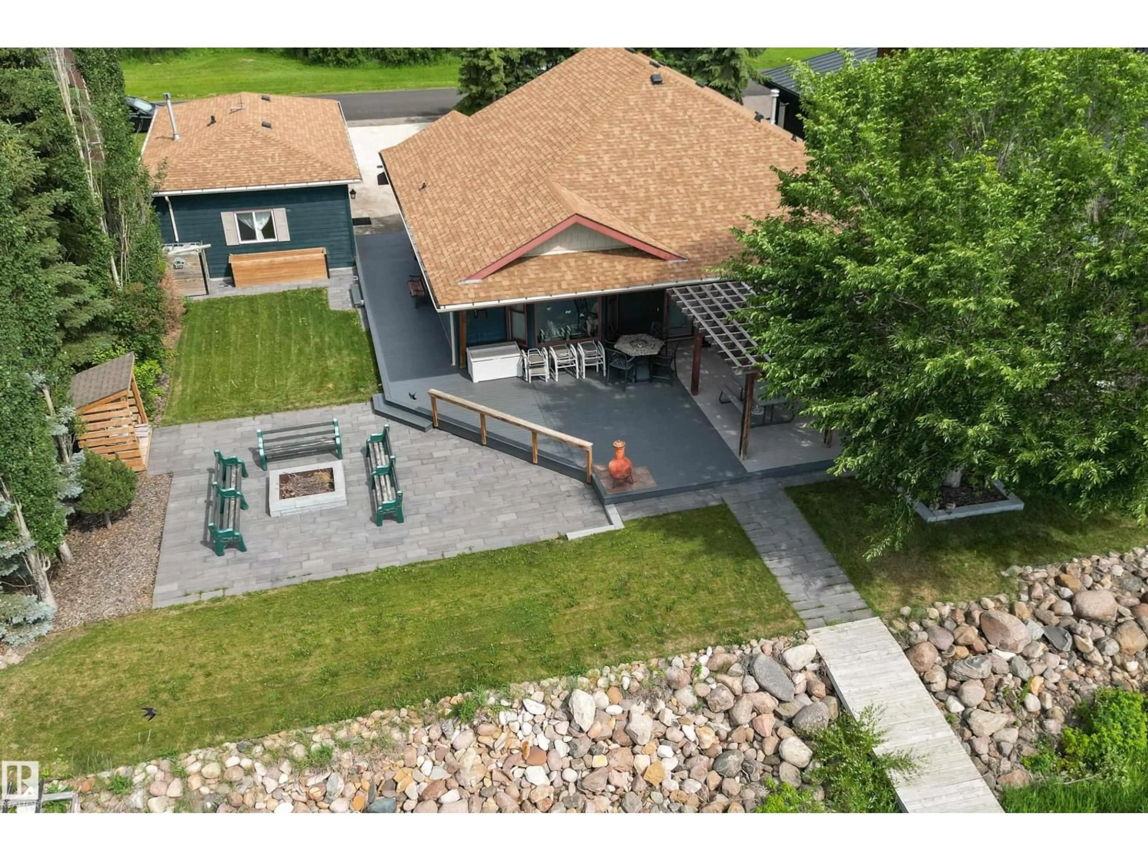 A pic from outside/outdoor area/front of a property/back of a property/a pic from drone, street for 103 ARGENTIA BEACH, Rural Wetaskiwin County Alberta T0C2C0