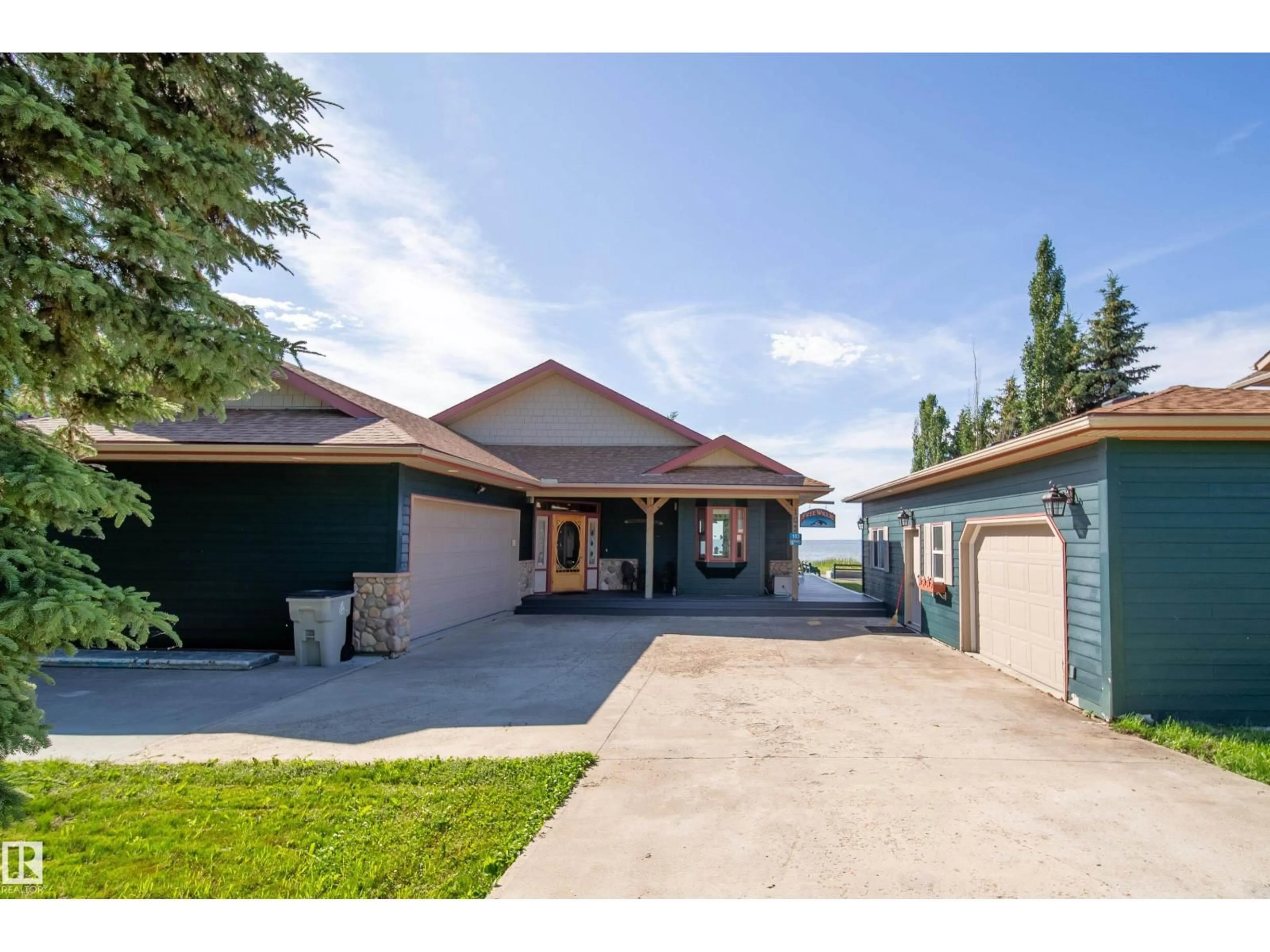 A pic from outside/outdoor area/front of a property/back of a property/a pic from drone, street for 103 ARGENTIA BEACH, Rural Wetaskiwin County Alberta T0C2C0